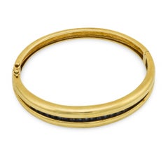 Vintage 2.50 carat sapphire 14k yellow gold bangle