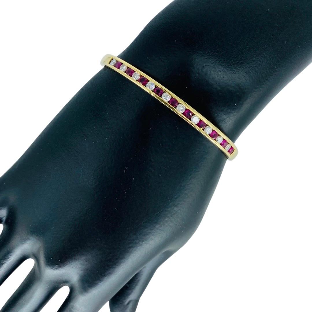 Vintage 2.50 Carat Total Weight Diamonds and Ruby Channel Bangle 18k In Excellent Condition In Miami, FL