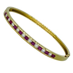 Vintage 2.50 Carat Total Weight Diamonds and Ruby Channel Bangle 18k