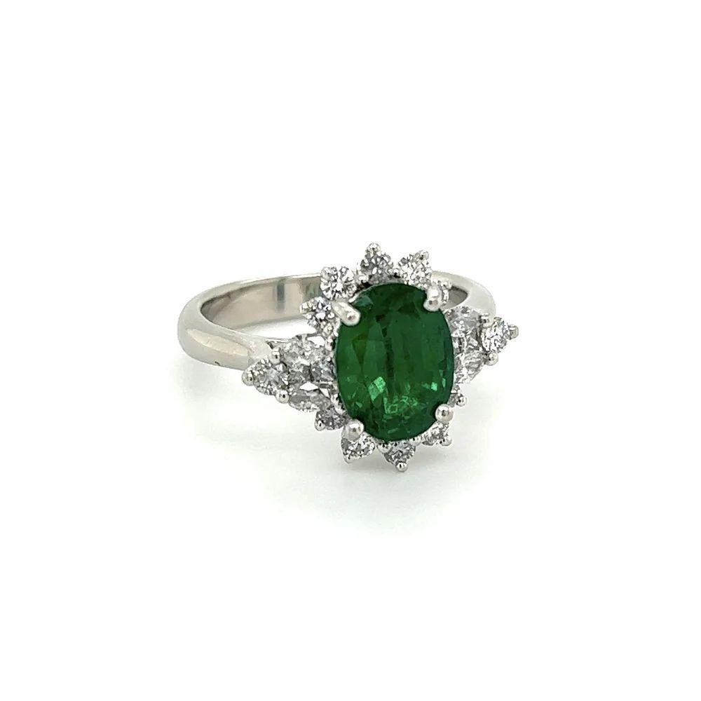 Simply Beautiful! Elegant and finely detailed Gorgeous Vintage Emerald MINOR GIA and Diamond Platinum Cocktail Ring. Centering a securely nestled Oval Emerald Minor GIA, weighing approx. 2.54 Carat. Surrounded by Diamonds, approx. 1.10tcw. The ring
