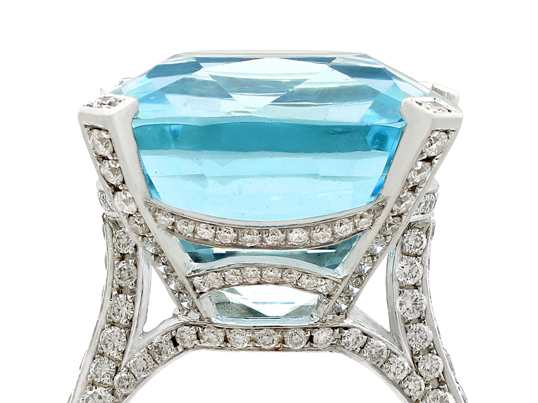 A stunning vintage 1990s 25.61 carat aquamarine and 3.02 carat diamond, 18 karat white gold cocktail ring; part of our diverse gemstone jewelry and estate jewelry collections.

This stunning, fine and impressive large aquamarine cocktail ring has