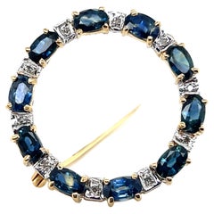 Vintage 2.59 TCW Sapphire and Diamond 14k Yellow Gold Circle Brooch 1960s