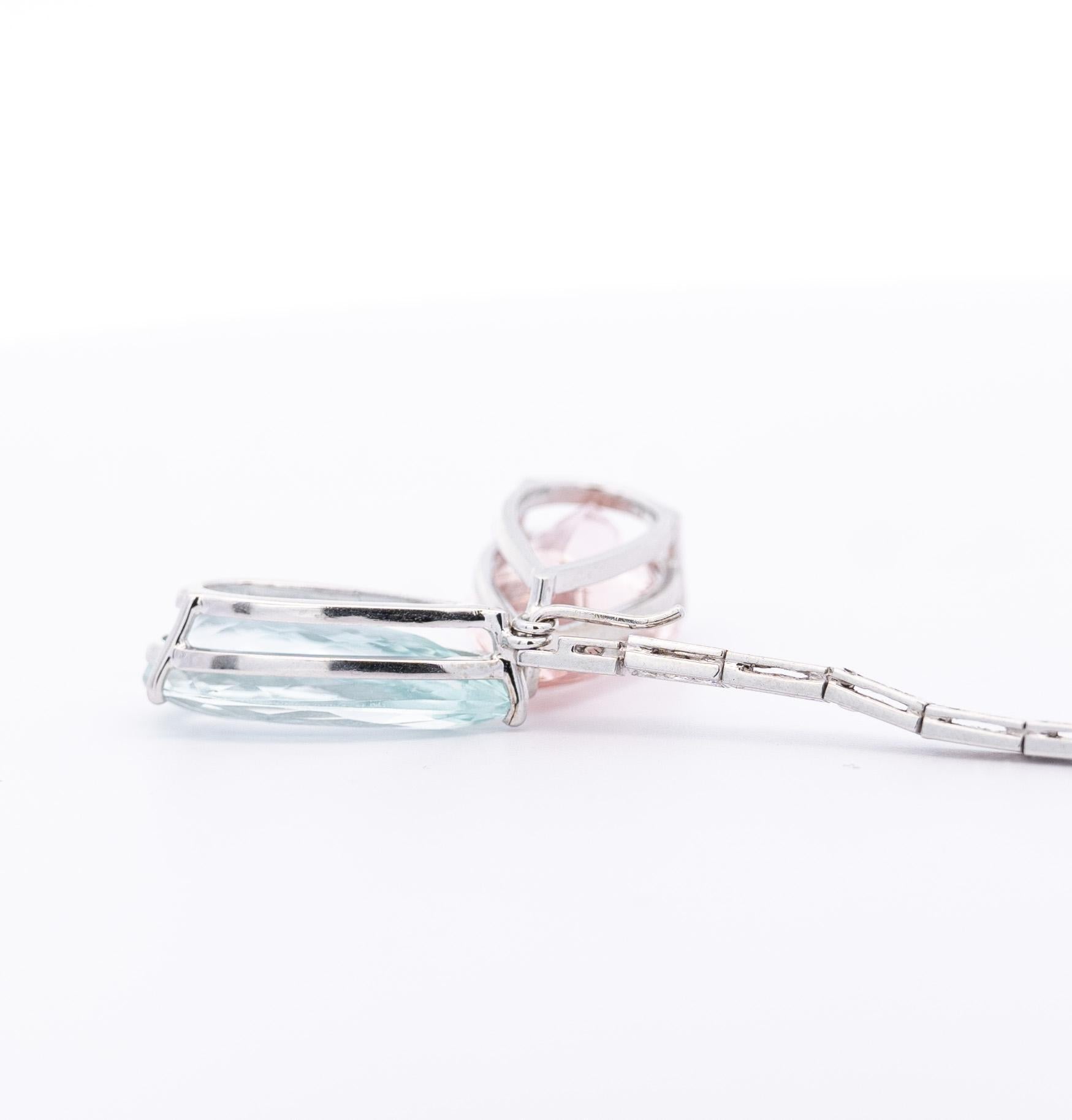 Vintage Aquamarine, Kunzite & Diamond Detachable Mix/Match Earrings. 

Mix/match detachable dangle drop earrings, featuring 26CTTW of pastel pink pear shaped Kunzite and pastel blue aquamarine. The length of the earrings is adorned with 48 round-cut