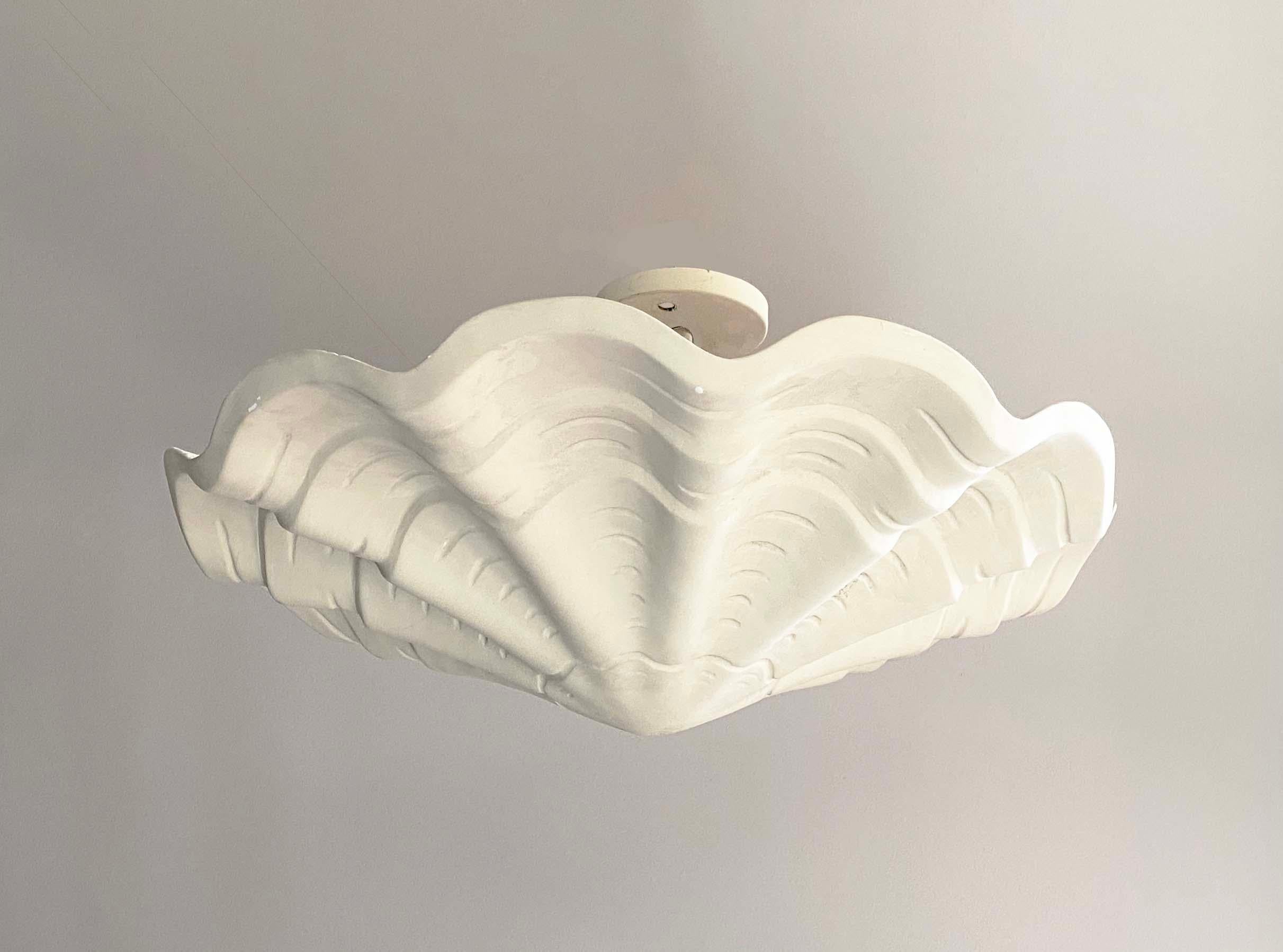 Here is a large vintage hanging pendant light fixture or chandelier from the 1970s and most likely made by Sirmos. This example (as well as two others we have posted on 1stdibs) is from a high-end San Francisco Russian Hill apartment building.