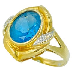 Anello cocktail vintage con acquamarina e diamanti a grappolo del peso totale di 2,60 carati