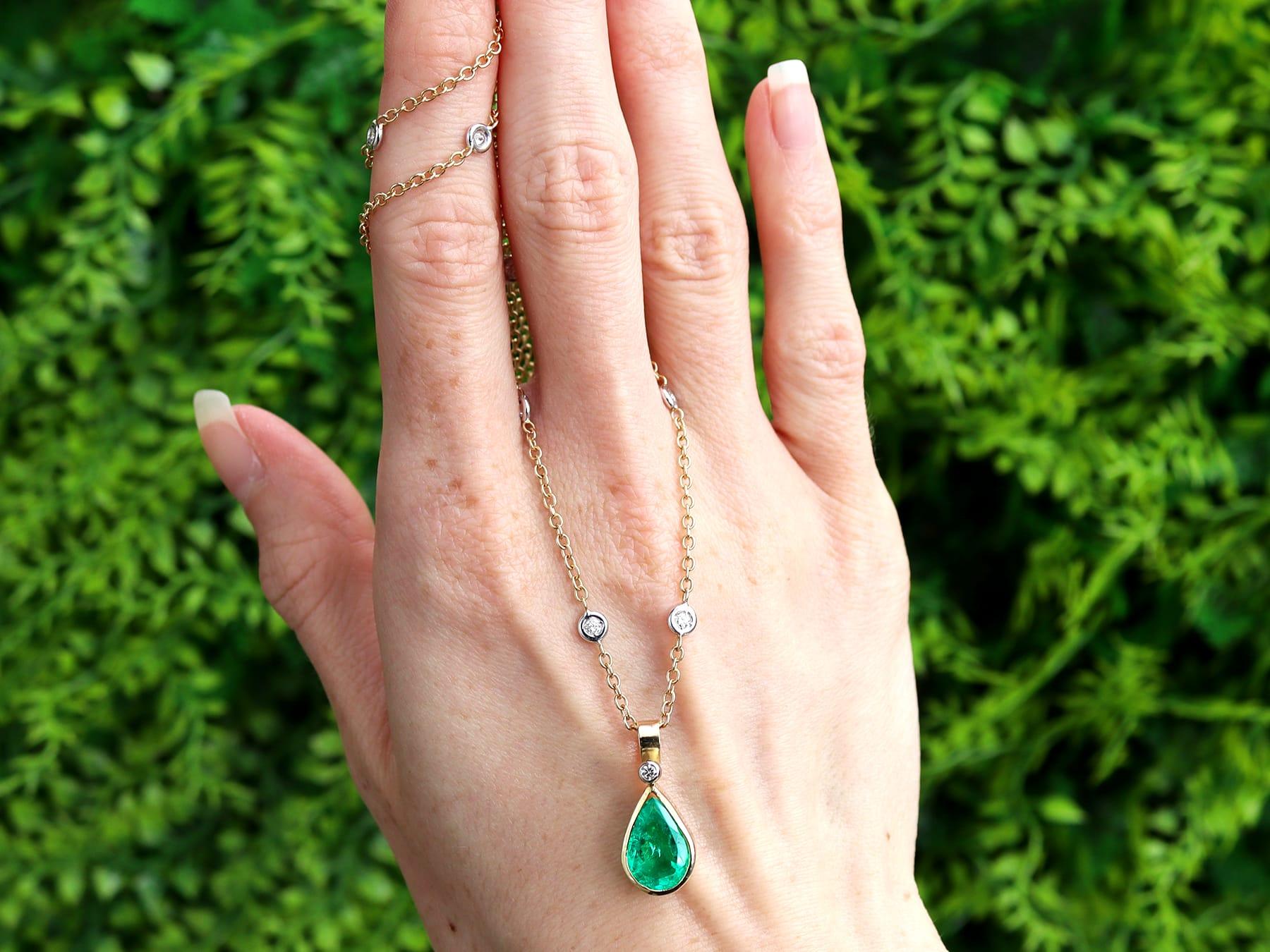 A fine and impressive vintage 2.60 carat emerald and 0.69 carat diamond, 18 karat yellow gold and 18 karat white gold set pendant; an addition to our vintage jewellery and estate jewelry collections.

This impressive vintage emerald necklace has