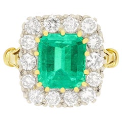 Retro 2.60 Carat Emerald and Diamond Cluster Ring, circa 1970s