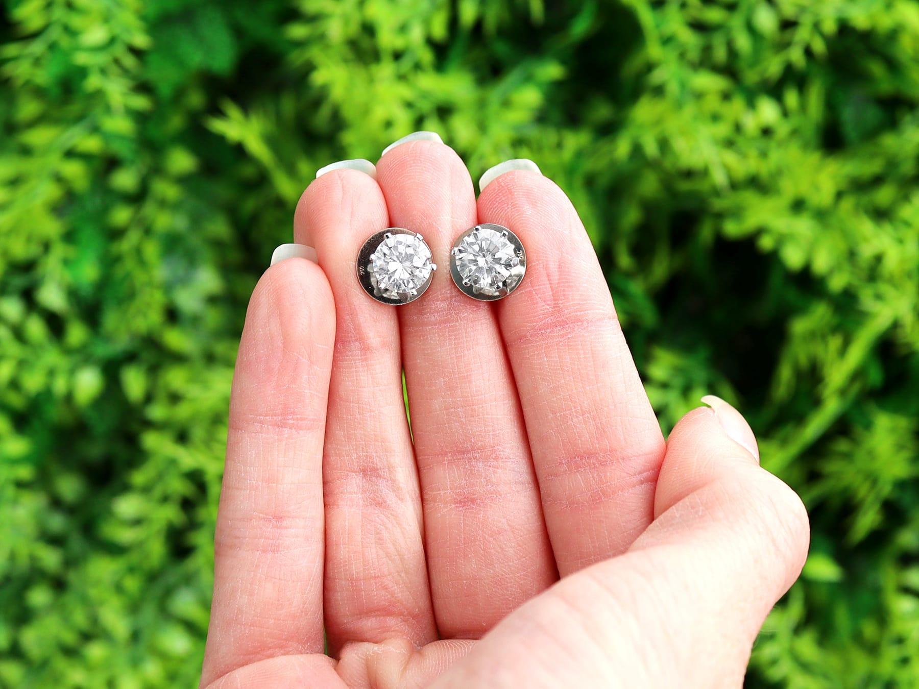 A stunning, fine and impressive pair of vintage 1980's 2.65 carat diamond and platinum stud earrings; part of our diverse vintage diamond earrings collection.

These stunning, fine and impressive vintage stud earrings have been crafted in