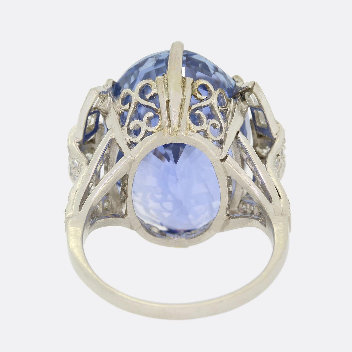 Oval Cut Vintage 26.93 Carat Unheated Ceylon Sapphire and Diamond Ring For Sale