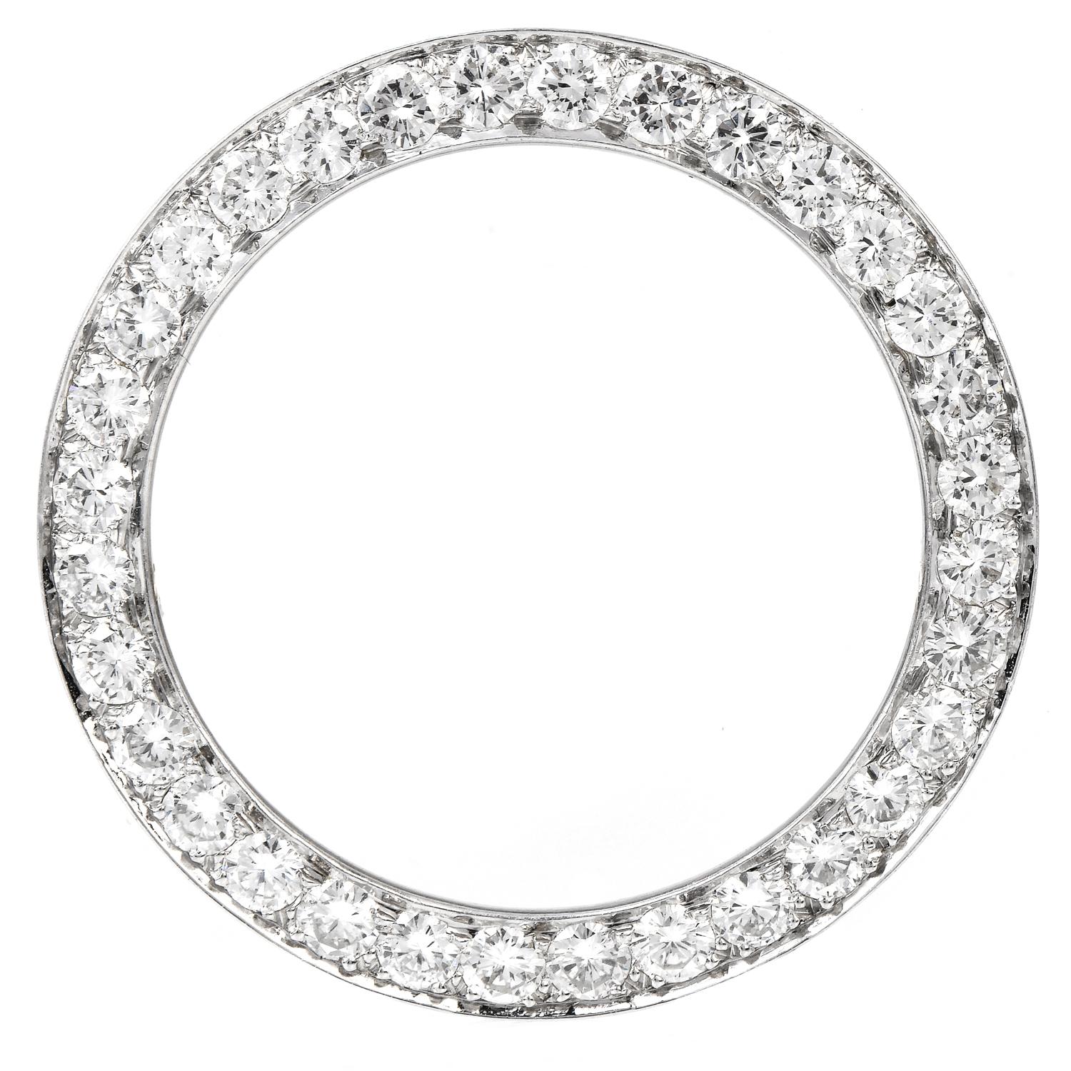 Dazzle with this vintage 1960's diamond & platinum brooch, wreath inspired with a circular shape.

Crafted in solid platinum, composed of (30) round-cut, pave sets, Diamonds weighing approximately 2.80 carats (F-G color and VS1 clarity)

The