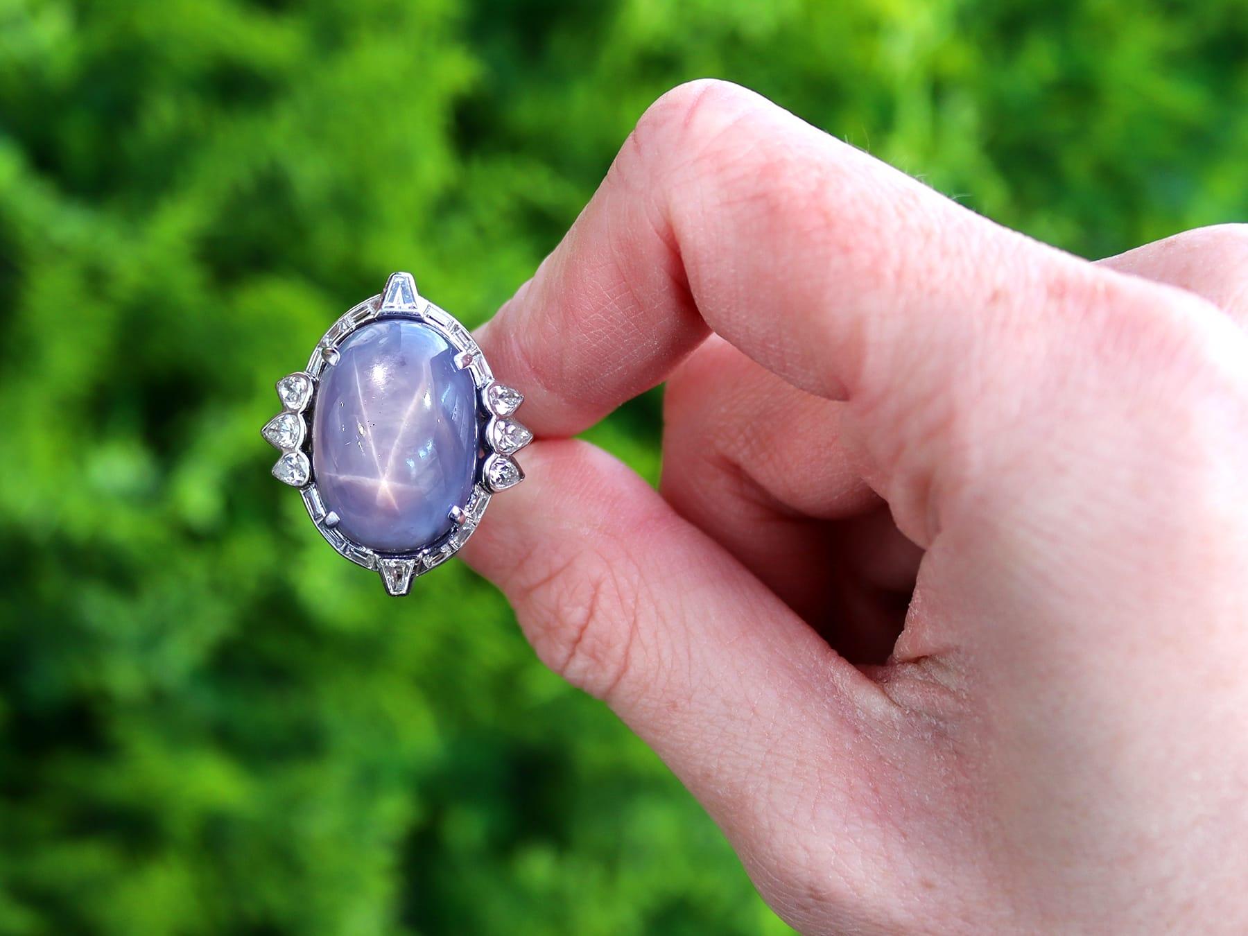 A stunning antique 1950's 28.18 carat star sapphire and 2.76 carat diamond, platinum and white gold set dress ring; part of our diverse antique jewellery and estate jewelry collections

This stunning, fine and impressive vintage sapphire ring has