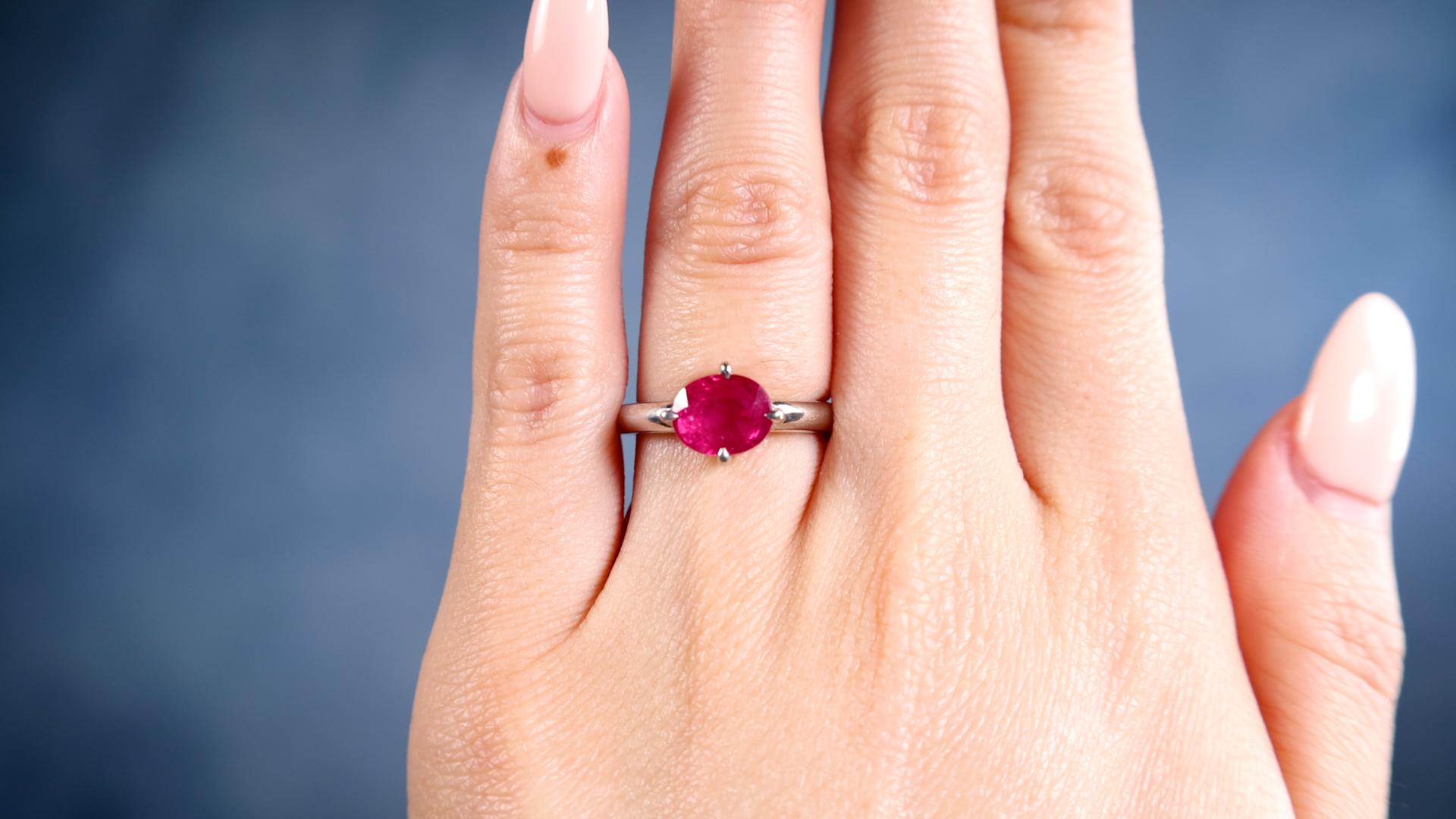 One Vintage 2.84 Carat Ruby 18k White Gold Solitaire Ring. Featuring one oval mixed cut ruby of 2.84 carats. Crafted in 18 karat white gold with purity mark and ruby weight engraved on the inside of the band. Circa 2000. The ring is a size 6 and may