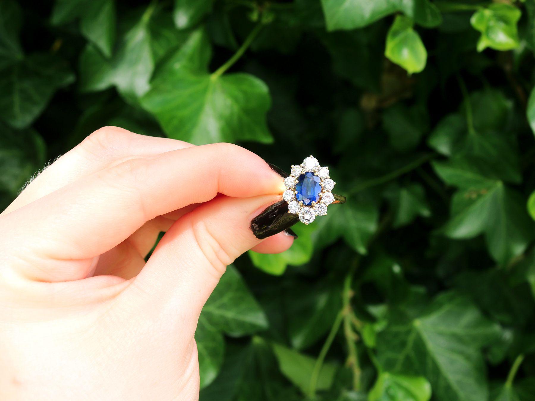 A stunning, fine and impressive vintage 2.90 carat sapphire and 1.62 carat diamond, 18 karat yellow gold cluster ring; part of our diverse gemstone jewelry and estate jewelry collections.

This stunning vintage sapphire and diamond ring has been