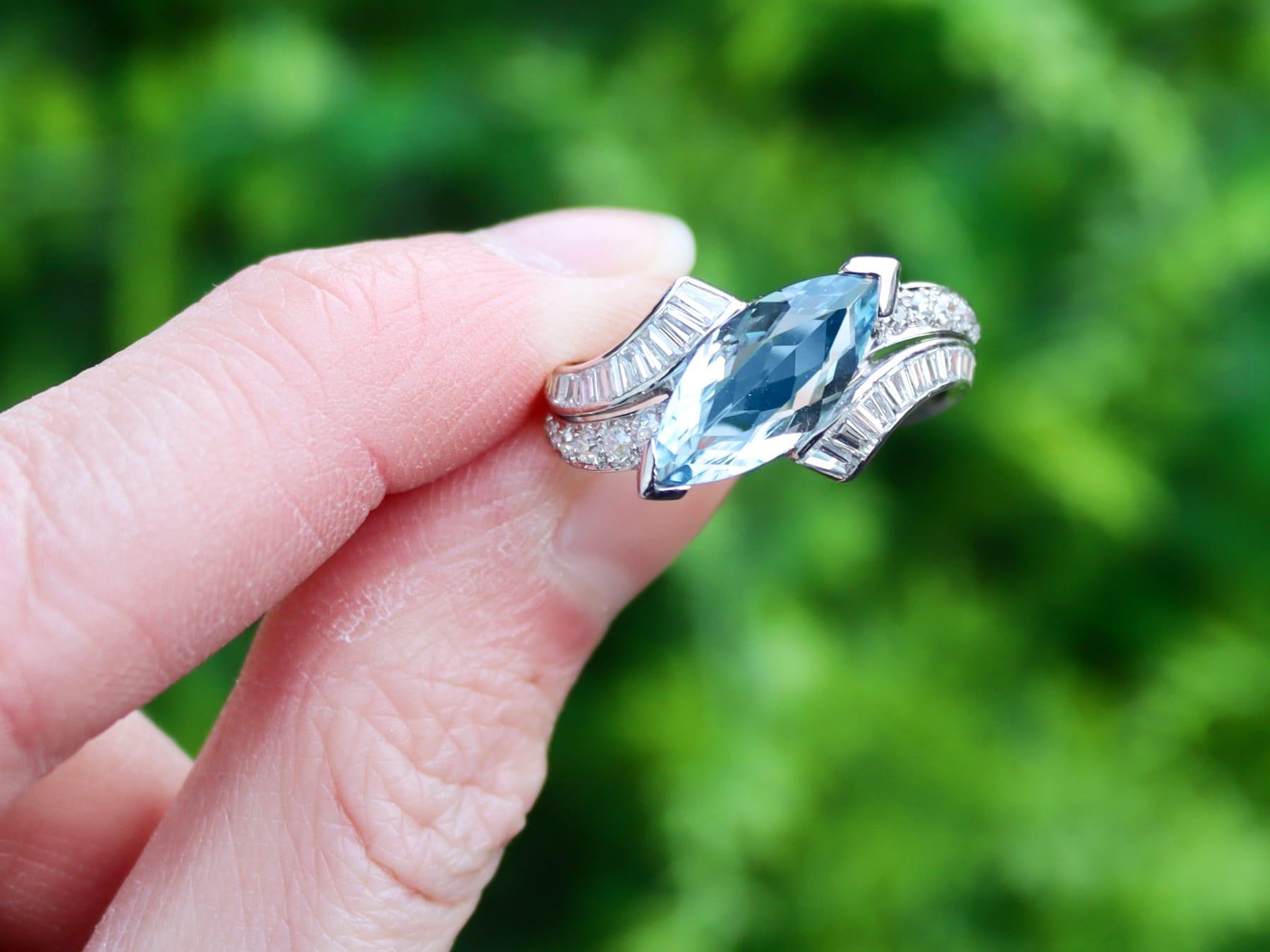 A stunning, fine and impressive vintage 2.92 carat aquamarine and 1.00 carat diamond, platinum dress ring; part of our diverse vintage jewellery and estate jewelry collections.

This stunning, fine and impressive vintage dress ring has been crafted