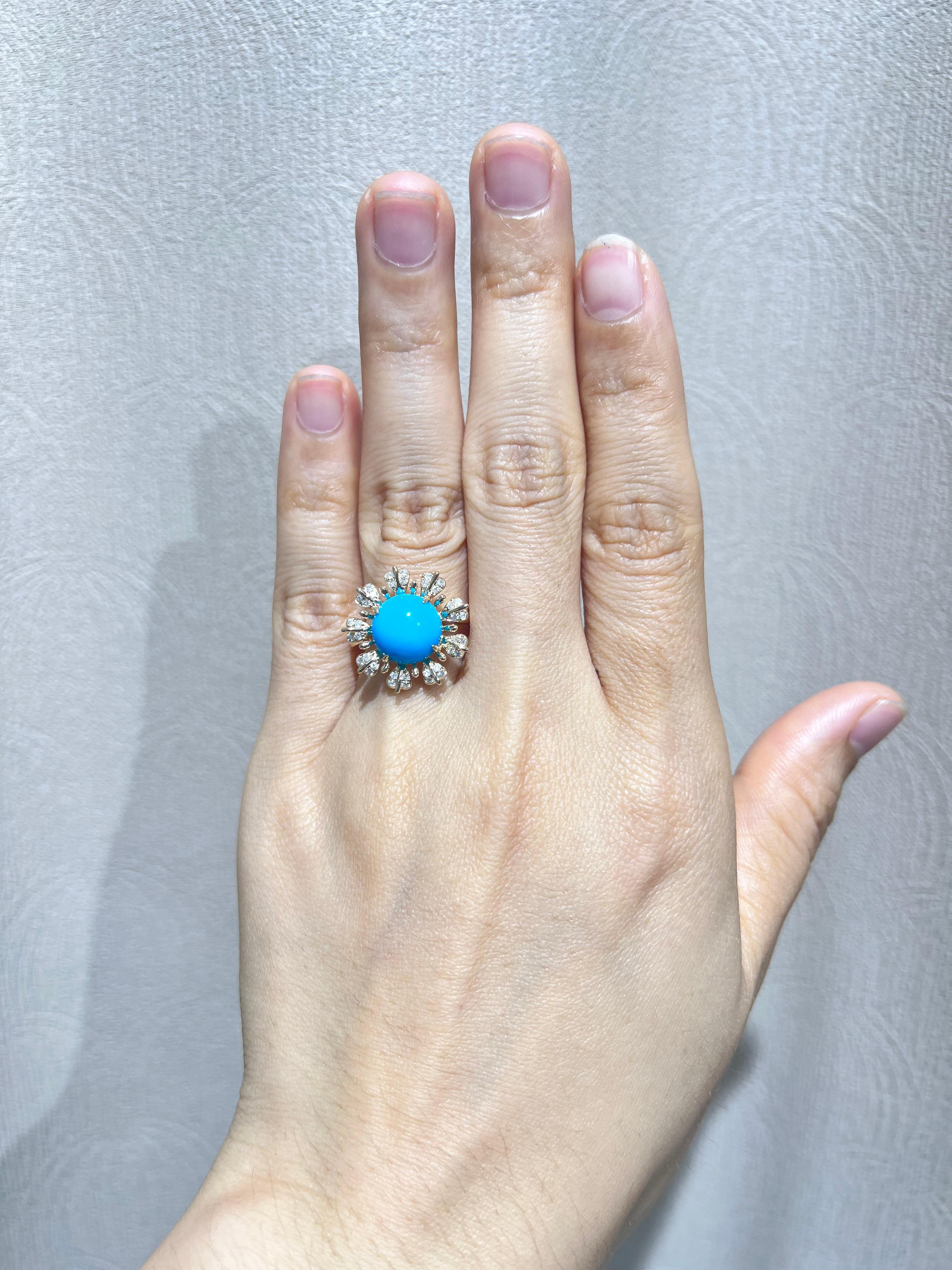 This breathtaking 14 Karat Yellow Gold Ring is a masterpiece that combines elegance and artistry.   At the heart of the design lies a 2.97-carat Sleeping Beauty Turquoise, a gemstone renowned for its captivating, vibrant blue hue that radiates a