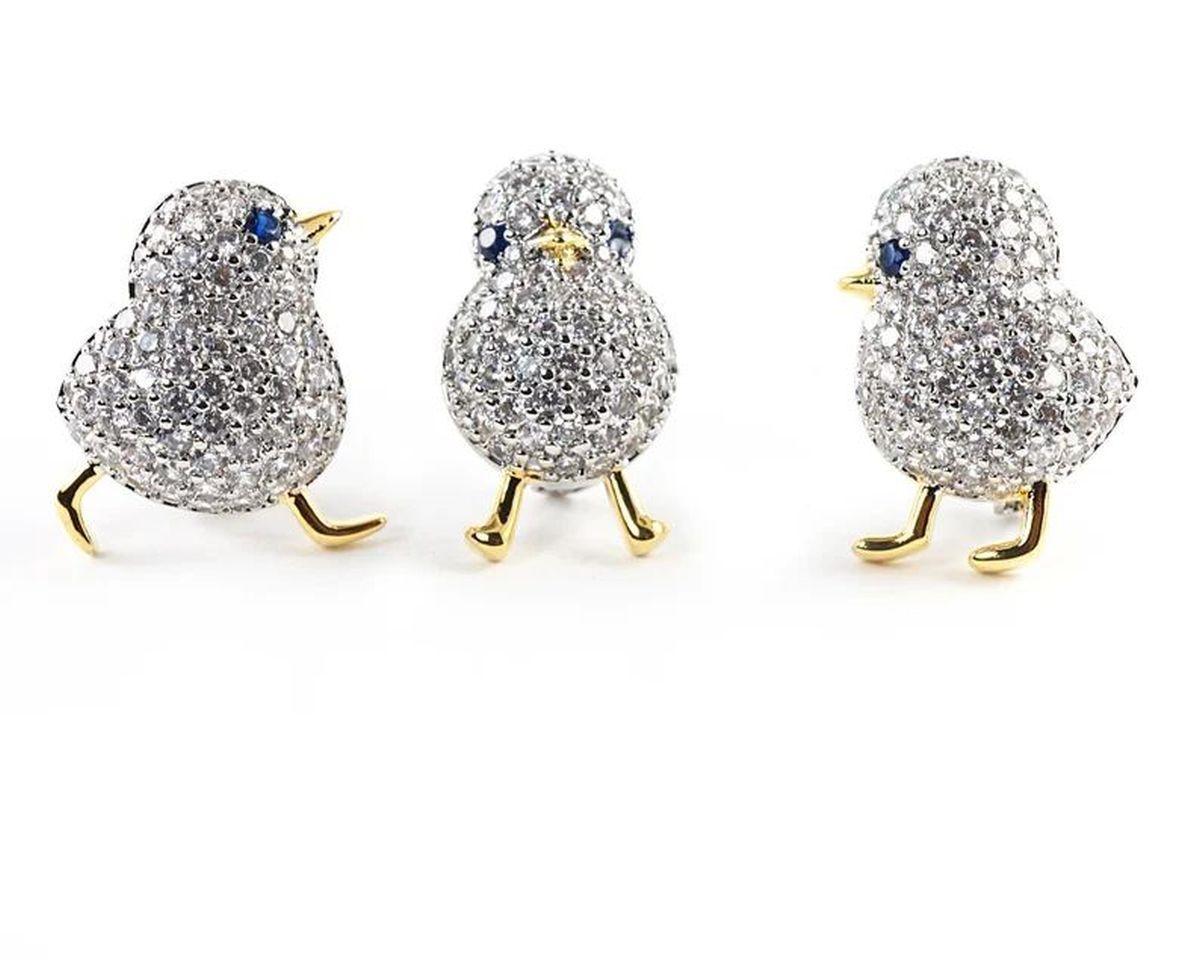 Simply Delightful! Vintage Three Tiny Chicks Bird Crystal Brooch Pins. The Chicks Beautifully encrusted with Sparkling Crystals and Blue Crystal Eyes. White and Yellow Gold tone mounting. Each Brooch measuring approximately 20mm long. Amazing