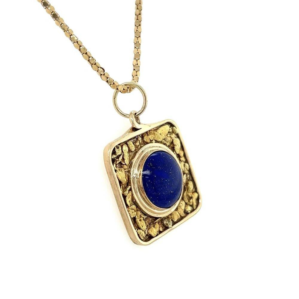 Simply Beautiful! Vintage Square Gold Nugget Lapis Lazuli Pendant Necklace. Centering a securely Hand set 3 Carat Round Lapis Lazuli in Hand crafted Square Nugget 18K Yellow Gold setting. Suspended from a Gold chain, approx. 30” long. More Beautiful