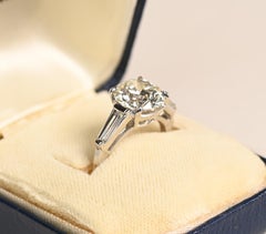 Vintage 3 Carat Ring. GIA Round Brilliant Diamond Baguette Side Engagement I SI2
