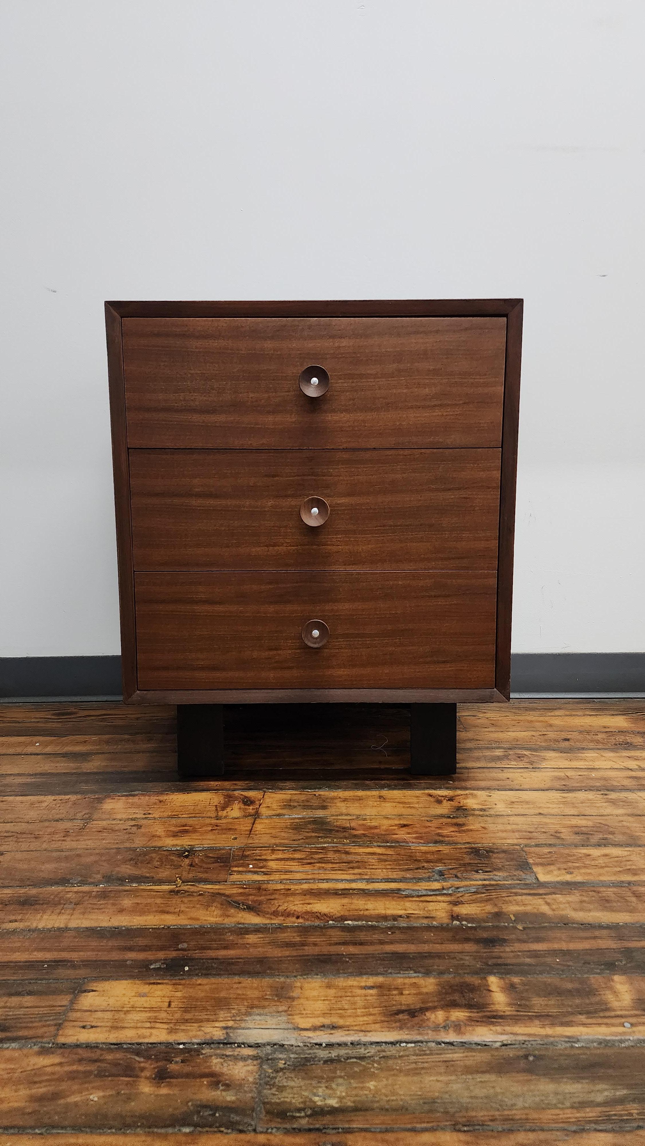 Walnut 3 drawer dresser with the classic cupcake pulls. This Dresser is part of the Basic Cabinet Series (BCS) designed by George Nelson for Herman Miller. 