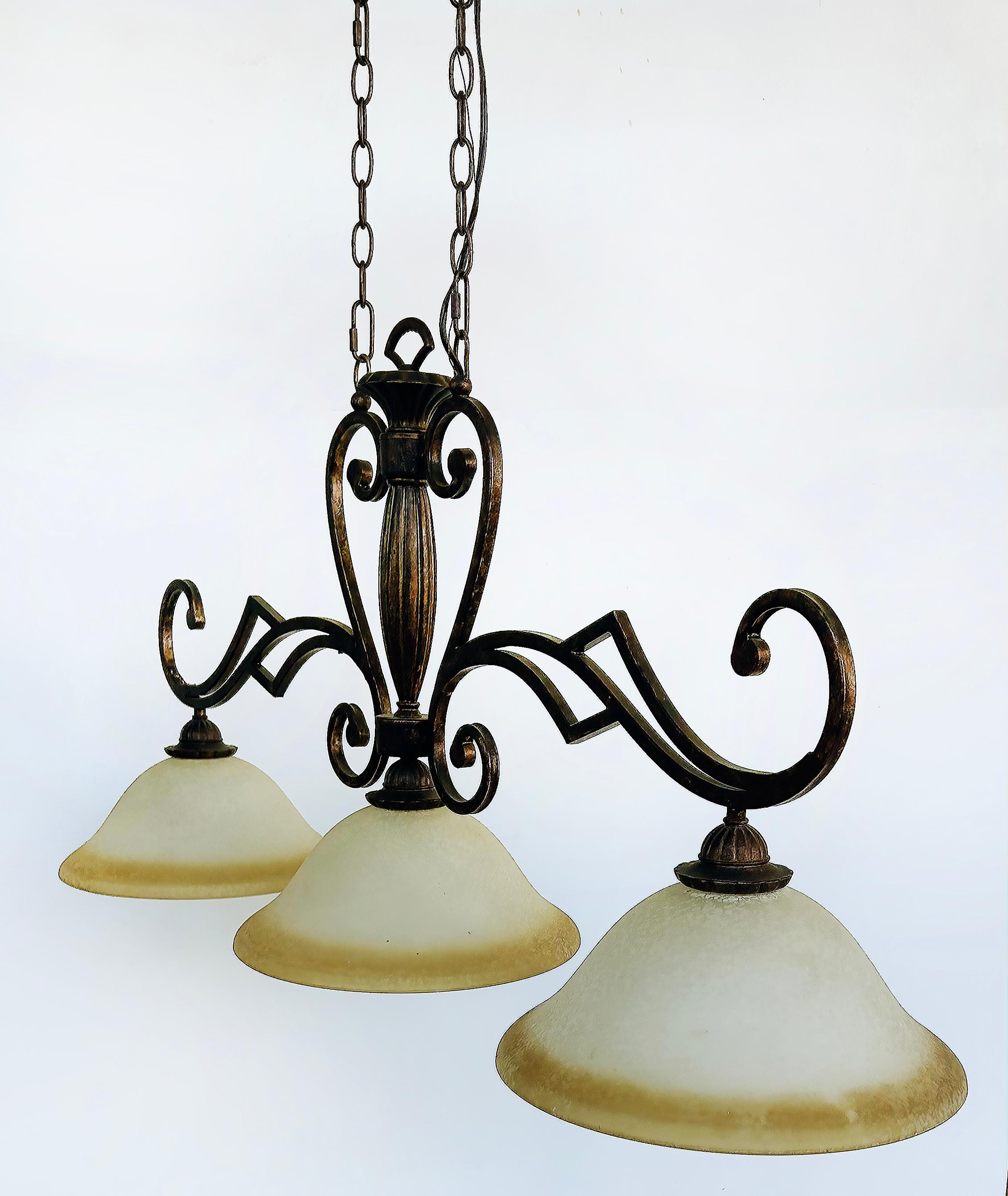 Vintage 3-Light Billiard Table or Kitchen Island Fixture 

Offered for sale is a three-light chandelier pendant light fixture which would be perfect above a billiard table, island or dining room table.  The painted metal frame is patinated in a dark