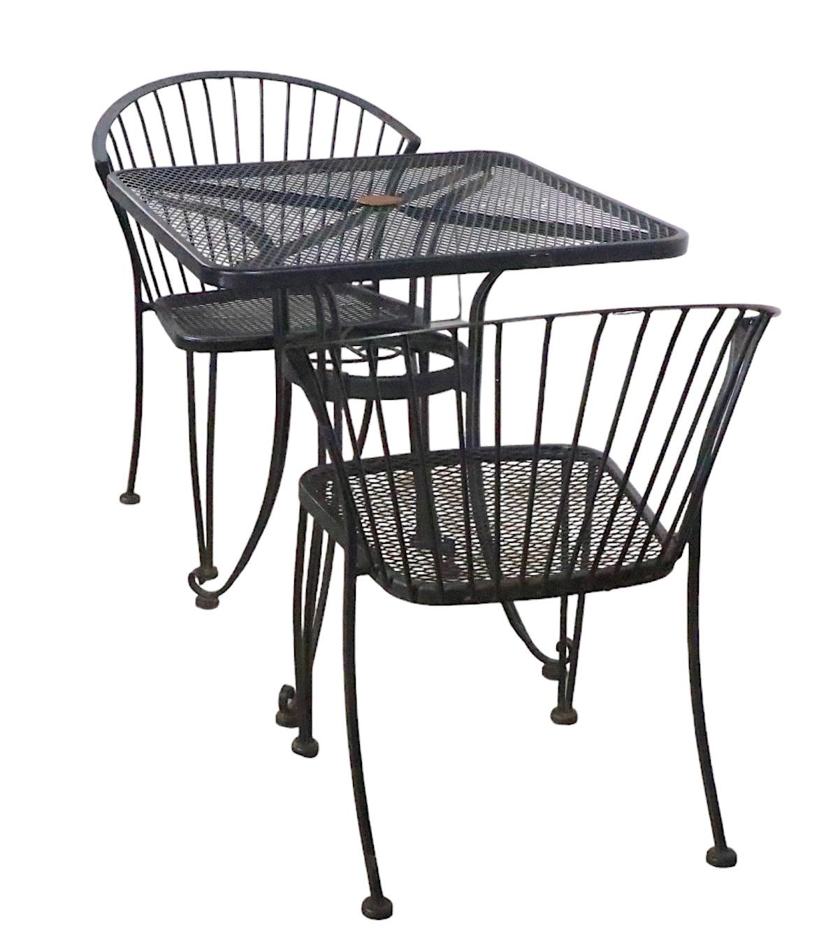 20th Century  Vintage  3 pc. Metal  Cafe Bistro Set by Carolina Forge Table with Two Chairs For Sale