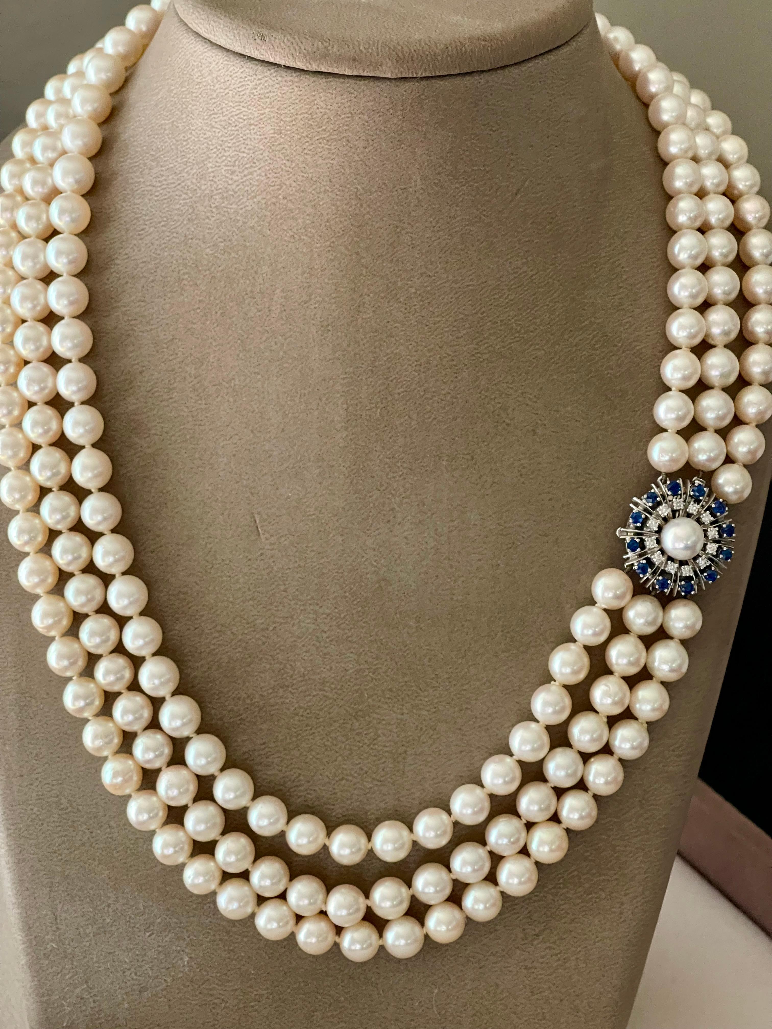 Vintage 3 row Akoya long Necklace 18 white Gold Sapphire Diamond clasp In Good Condition In Zurich, Zollstrasse