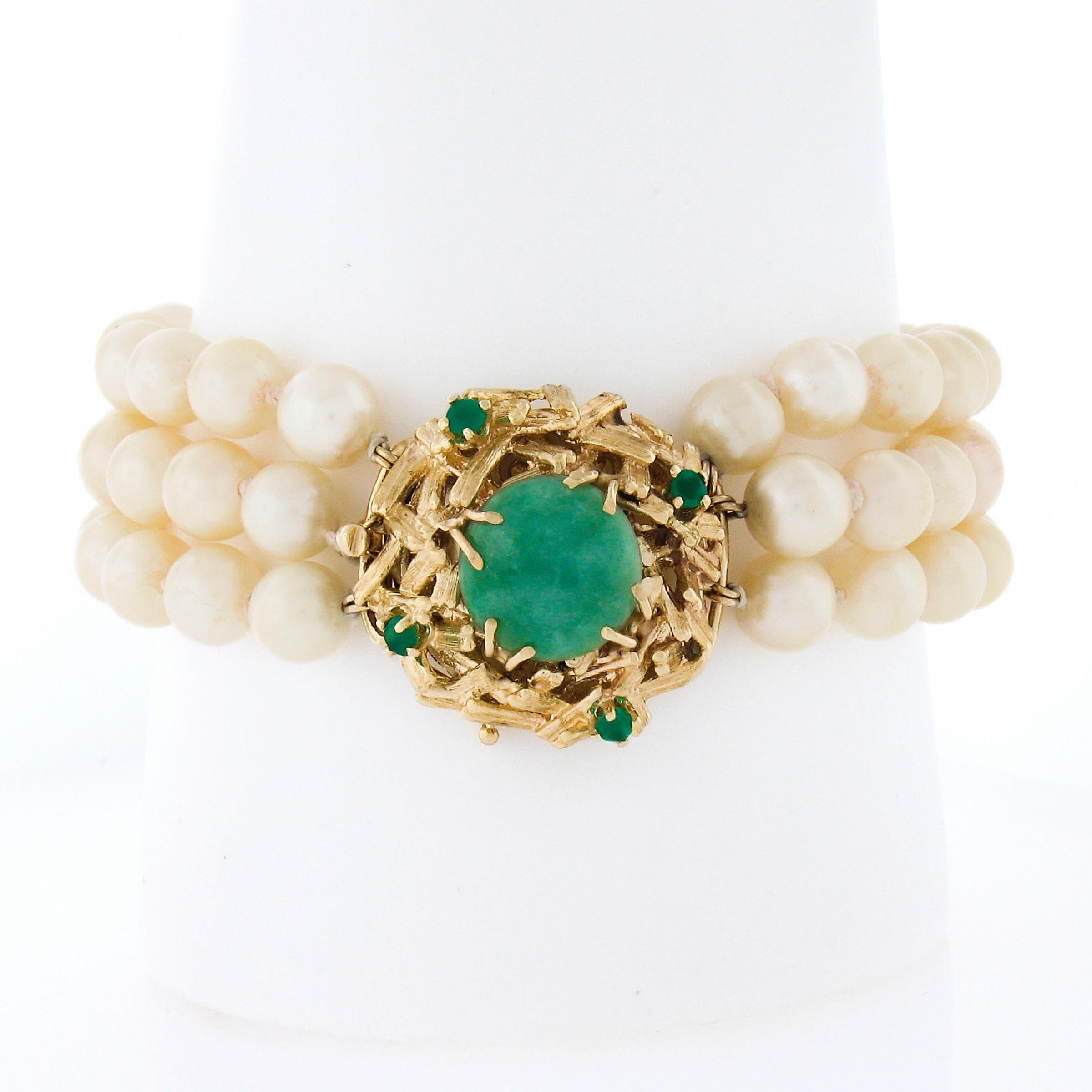 This gorgeous vintage bracelet is constructed from 3 rows of nice quality round cultured pearls that are neatly strung throughout with a fancy clasp and bar spacers crafted from solid 14k yellow gold. These beautiful pearls are well matched in size