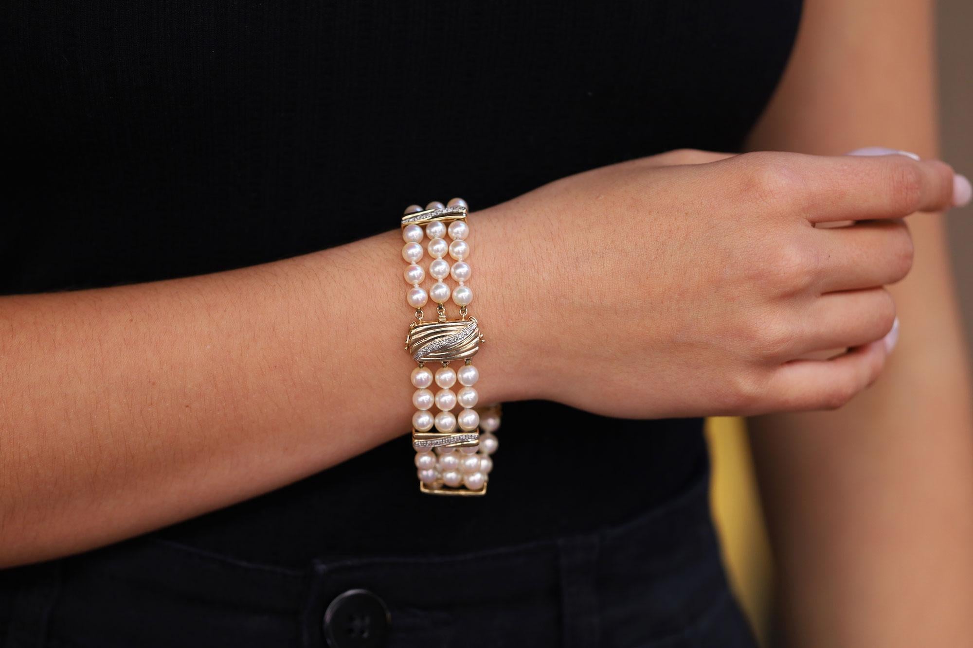 An essential wardrobe accessory and a wonderful gift for her, this vintage 3 row pearl bracelet is an enduring heirloom. The sculptural 14k yellow gold clasp and stations embellished with 73 sparkling diamonds lend a glimmer to the lustrous round