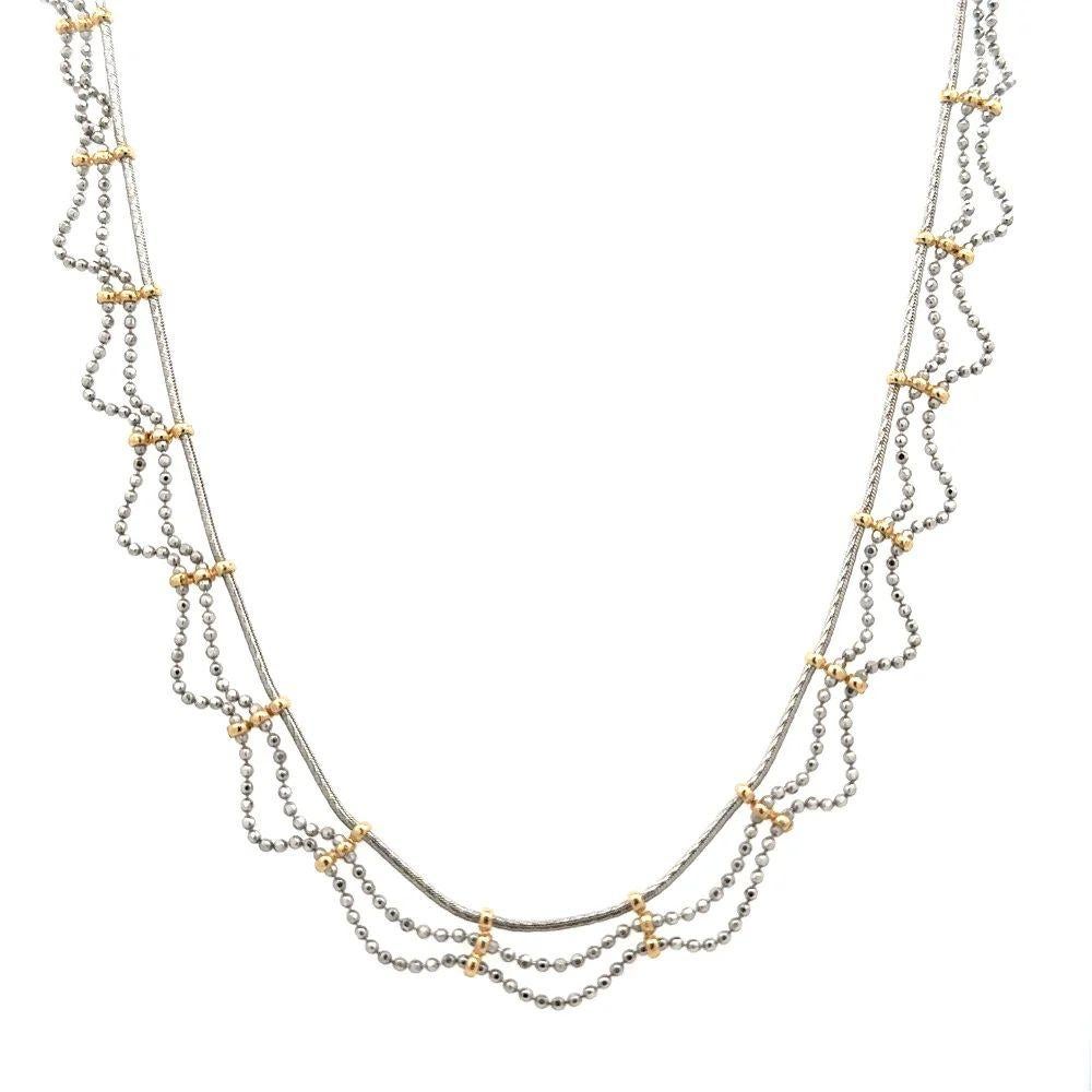 Simply Beautiful! Featuring 3 Long Rows Cascading 2 are Wavy Rows with Gold Ball Stations 2-Tone Gold Link Necklace. Featuring three rows of wavy gold, complete with round Gold Ball Stations. Hand crafted in 14K yellow and white Gold. Necklace