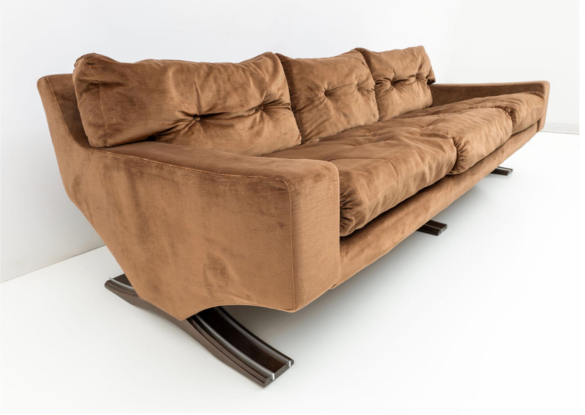 Franz Sartori is best known for his organic sculptural work but he also designed furniture which reflected his sculptural talent. 
 These incredible e seats sofa is extremely comfortable and also reflect the organic forms Franz Sartori is known for.