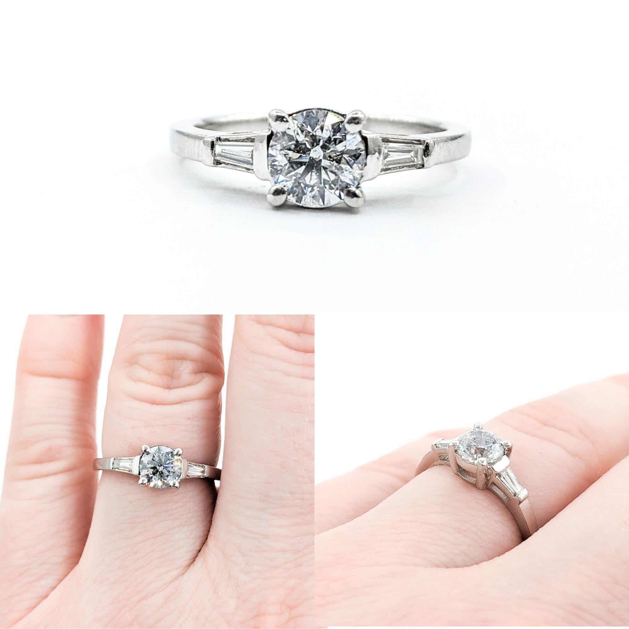 vintage 3-stone design Diamond Engagement Ring In Platinum

Introducing an exquisite Diamond Engagement Ring, expertly crafted in 950pt Platinum. This elegant ring showcases .94ctw of diamonds in a vintage 3-stone design, a timeless symbol of your