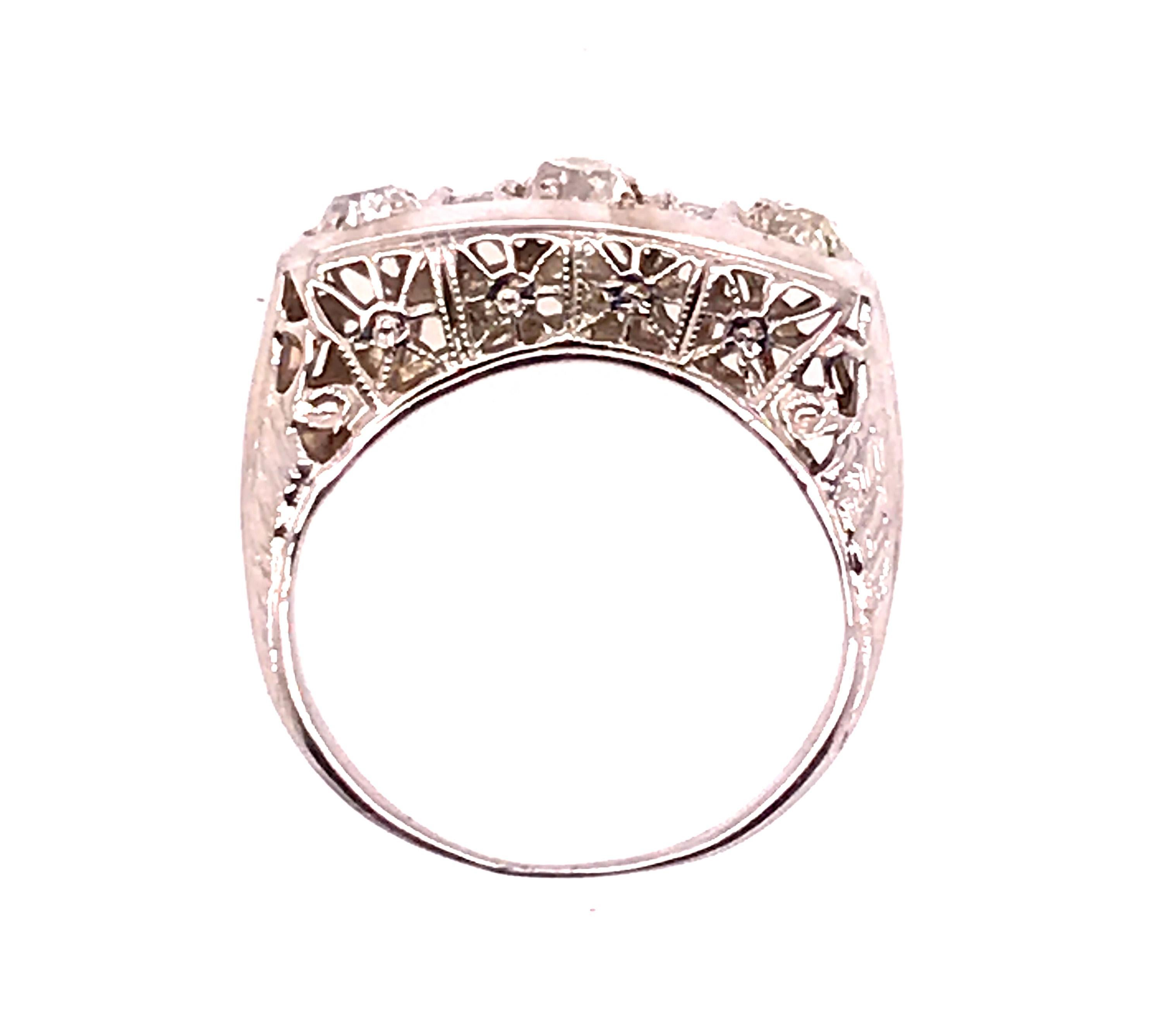 Genuine Original Antique from 1900s Vintage 3 Stone Diamond Cocktail Filigree Ring .70ct 18K Art Deco 


Features 3 Genuine Antique Old Mine Cushion Cut Center Diamonds

Antique Vintage Style with Elegance 

Beautiful Hand Carved Filigree and