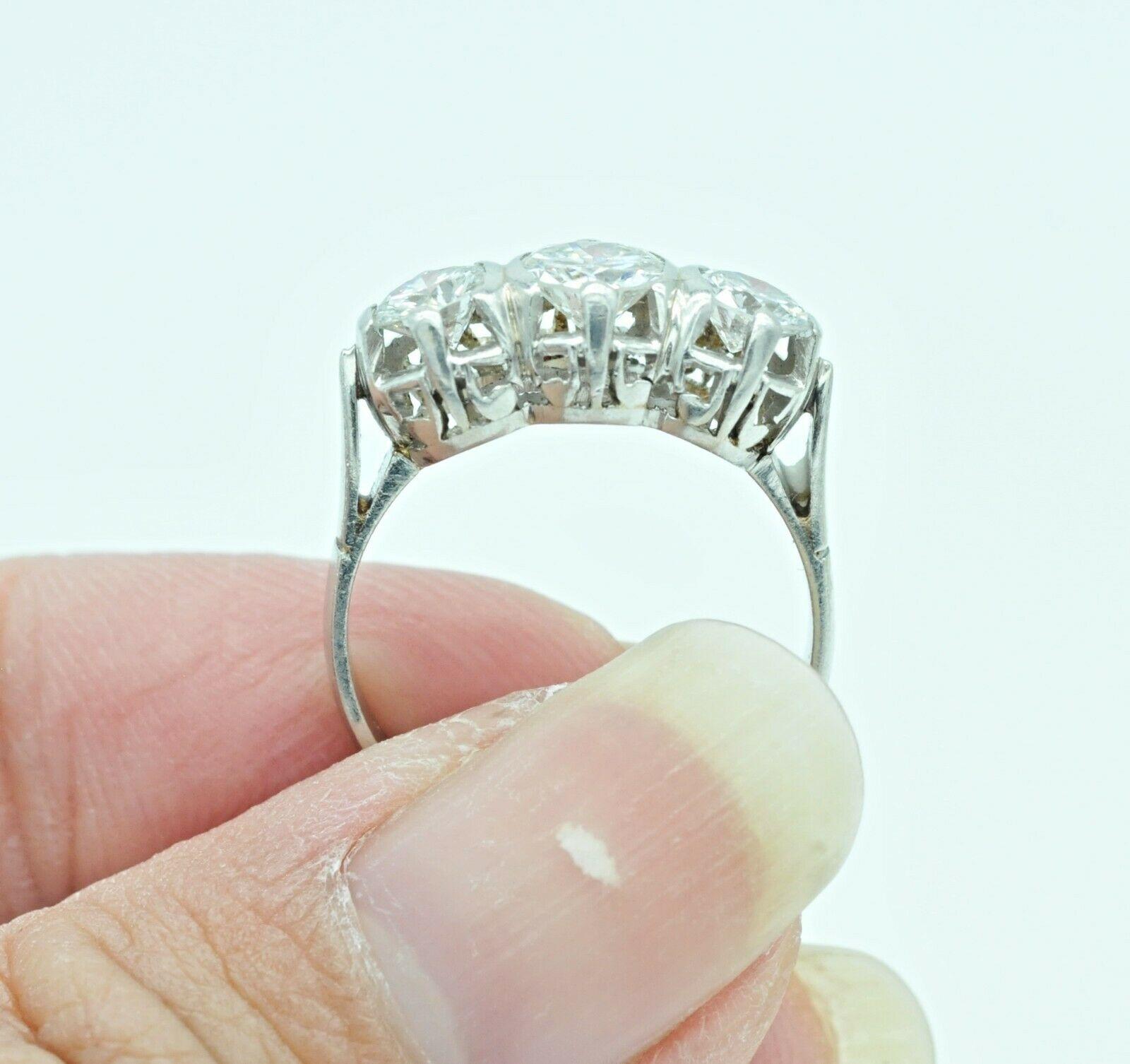 vintage 3 stone engagement rings