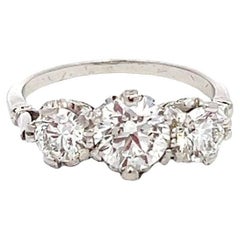 Vintage 3 Stone Diamond Ring with Diamond Encrusted Platinum Mounting