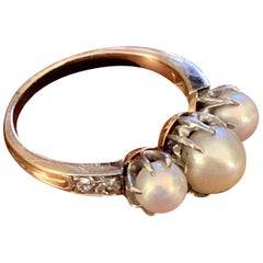 Vintage 3-Stone Pearl and Euro Cut Side Diamond 14 Karat Yellow Gold Ring