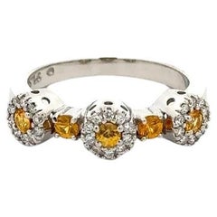 Anello d'oro vintage con zaffiro giallo e diamante RBC a tre pietre