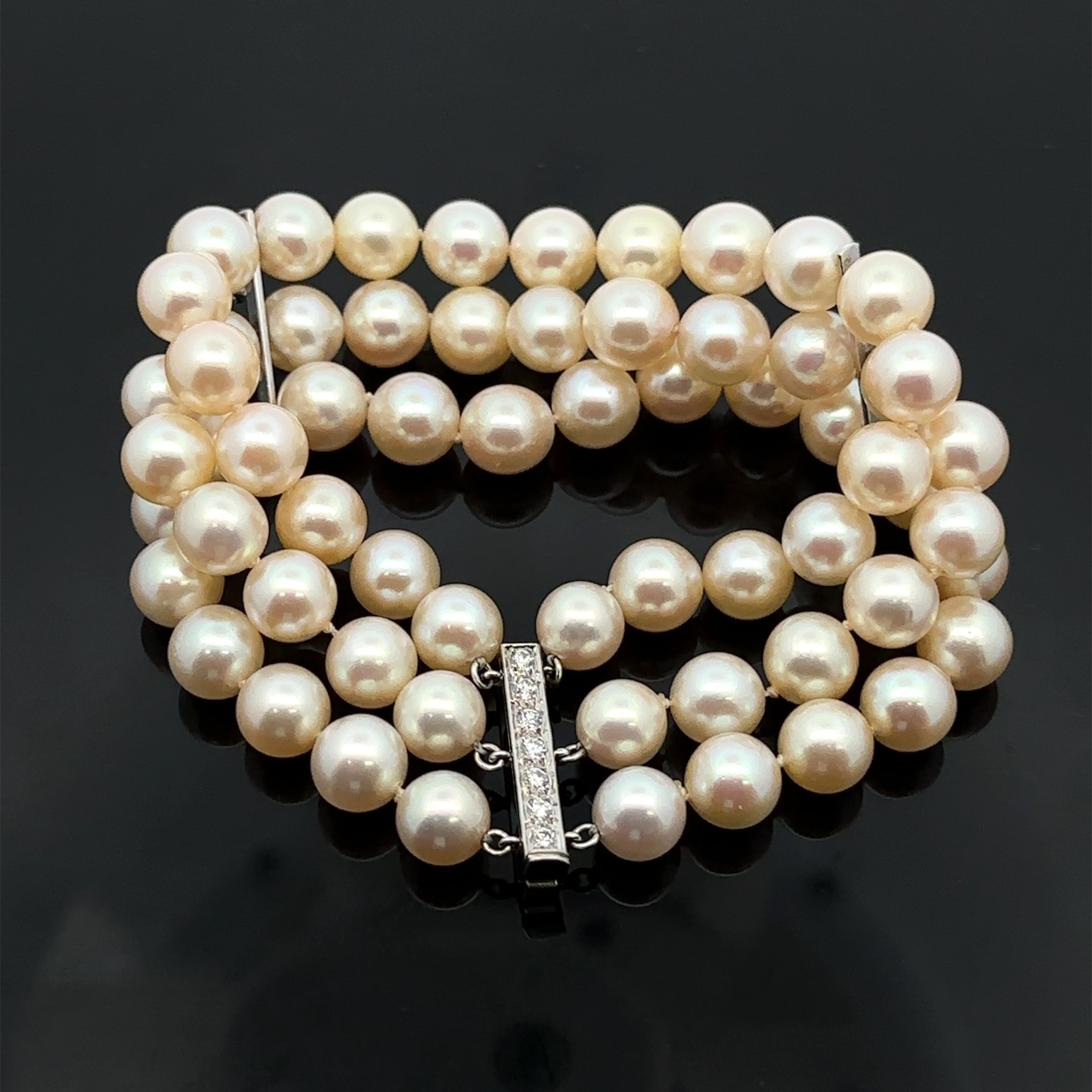--Stone(s):--
(63) Genuine Culture Pearls - Round Bead Shape - White Color w/ Pink Overtone - Very Nice Luster and High Quality Pearls -7.7-8.1mm each (approx.)
(11) Natural Genuine Diamonds- Round Brilliant Cut - Pave & Prong Set - Nice Brilliant