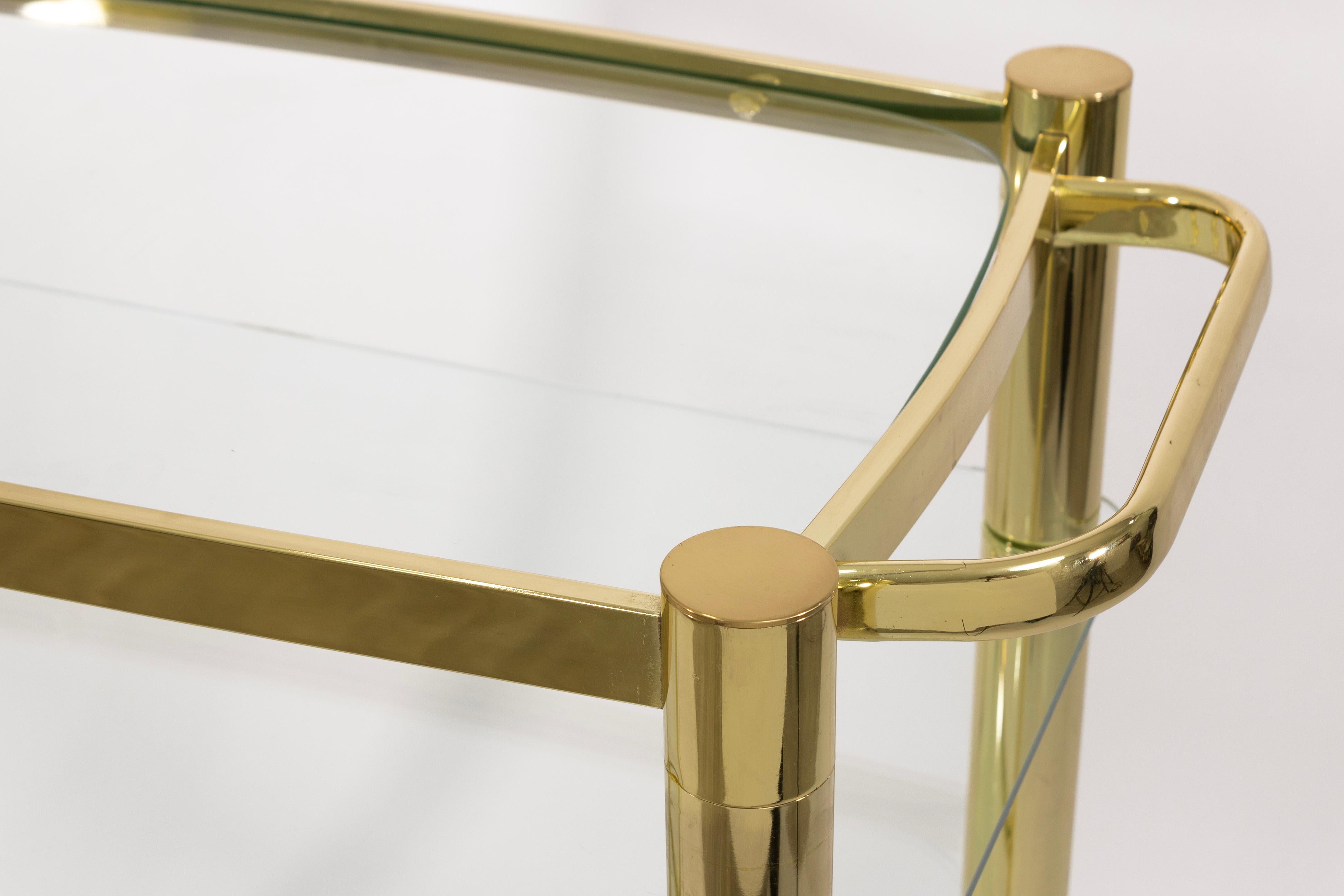 Vintage 3 Tier Hollywood Regency Style Brass and Glass Rolling Bar Serving Cart In Good Condition For Sale In Keego Harbor, MI