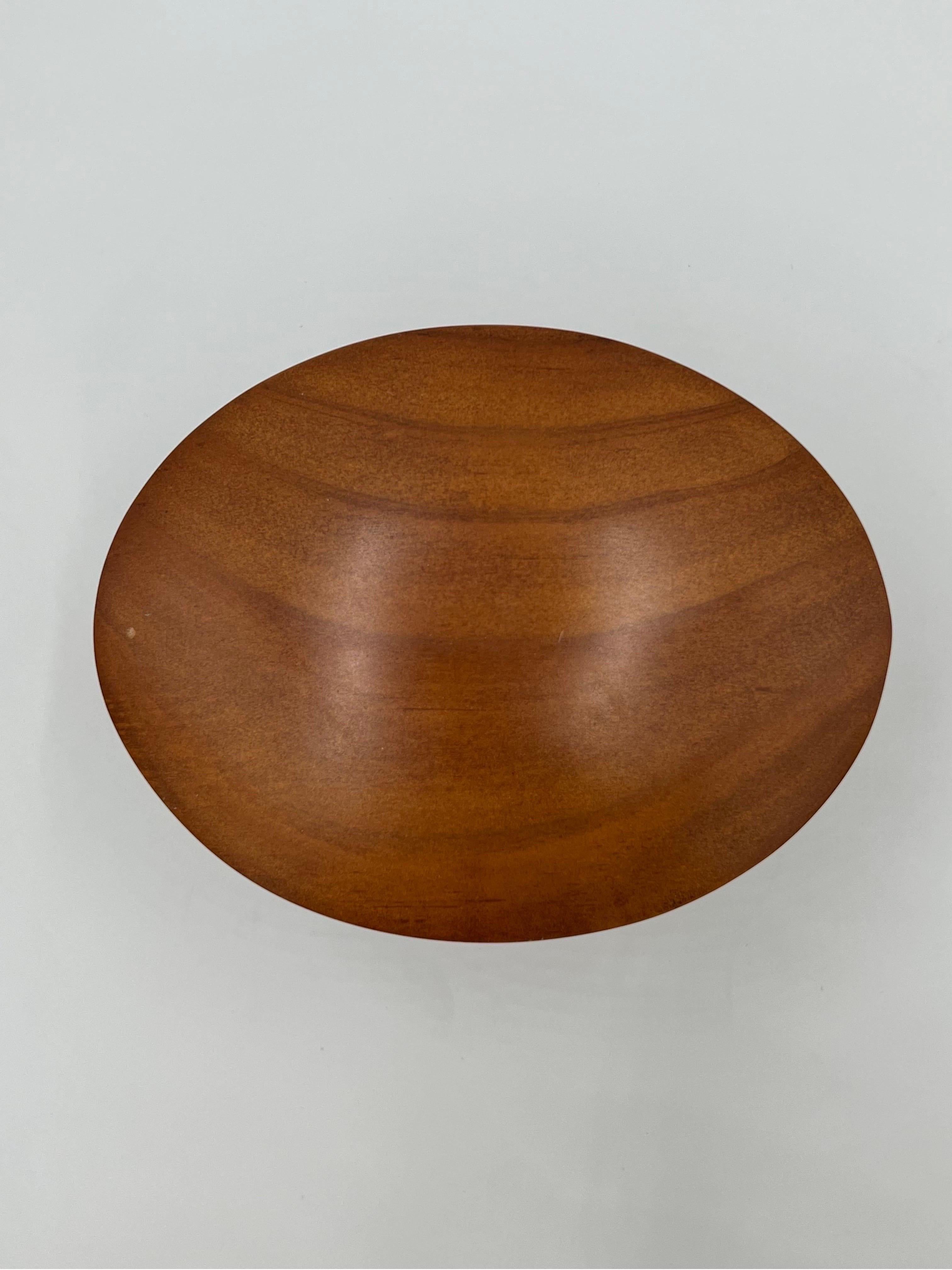 A fine vintage jewelry box constructed in maple with velvet lining to each of the three sections. Unmarked.