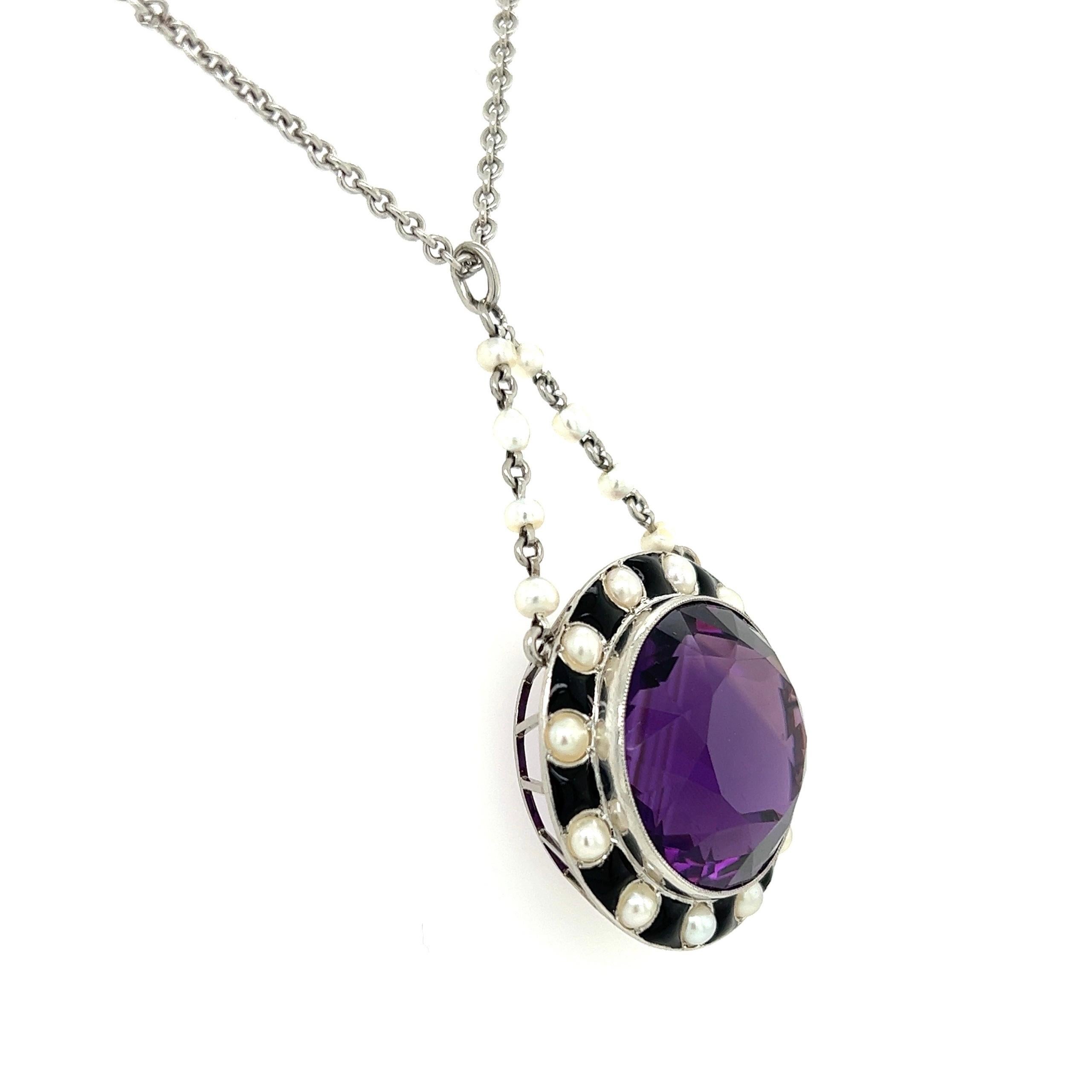 Simply Beautiful! Mid-Century Modern Amethyst Onyx and Pearl Hand crafted Gold Drop Necklace. Centering a 30 Carat Round Amethyst, surrounded by Onyx and Pearls. Approx. dimensions of Pendant: 2.06” l x 1.13” w x 0.55” h. Suspended from 18k white
