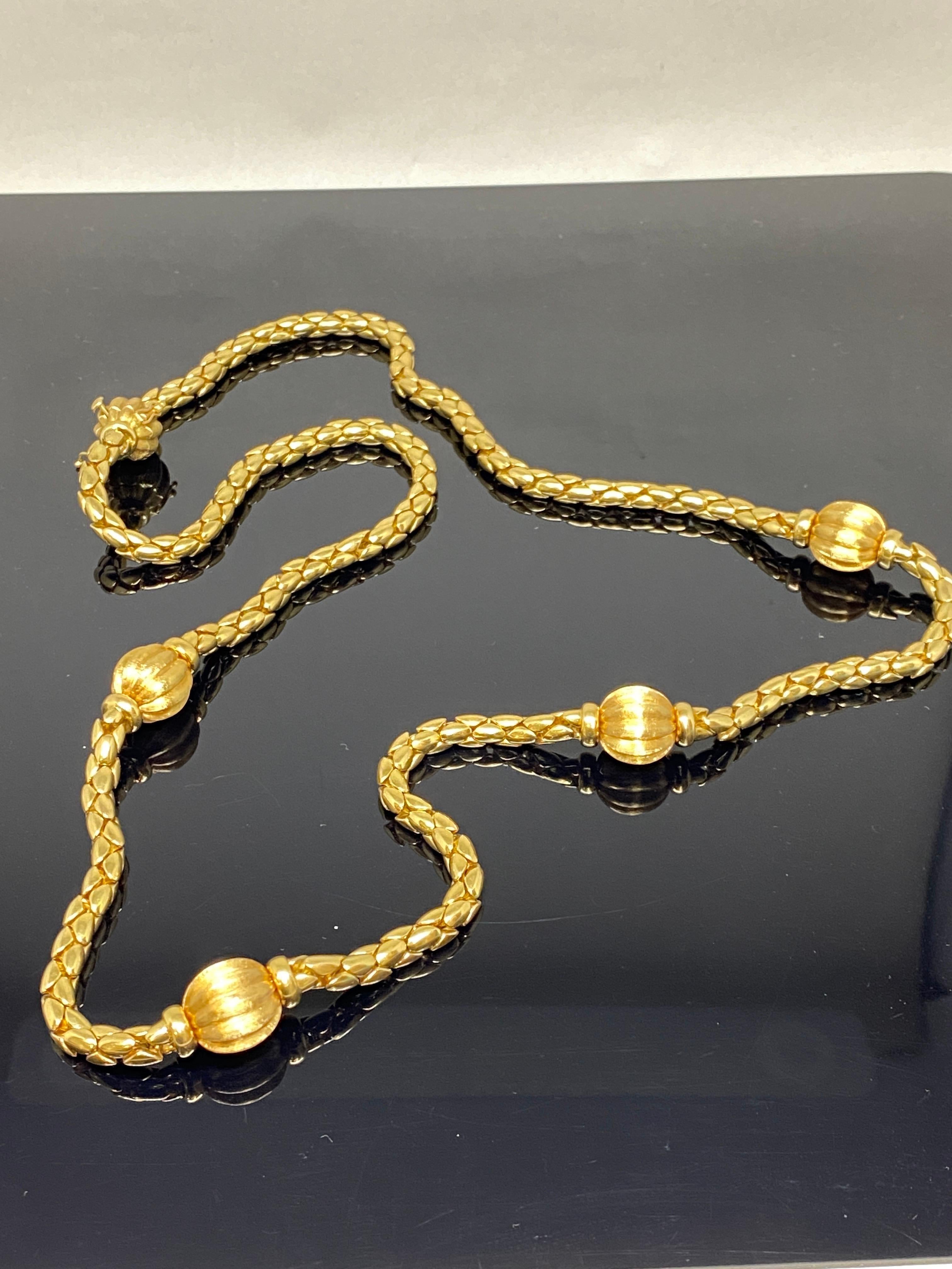 Truly a statement piece, this Italian solid 18K yellow gold necklace will turn heads on any occasion.  This substantial woven rope chain is 30