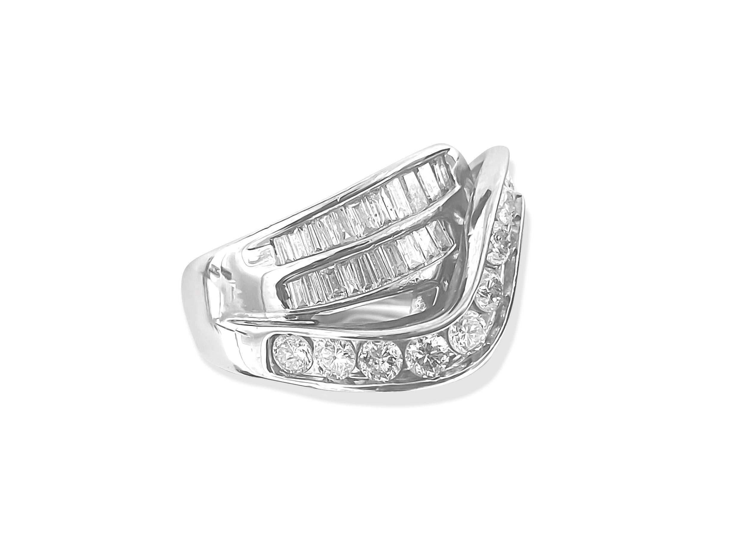 Metal: 14K White Gold. 
3.00 carat diamonds total.
VS-SI clarity and F-G color. Round and baguette cut. 100% natural earth mined diamonds. 
Ring size: US 7

Vintage style diamond engagement ring 