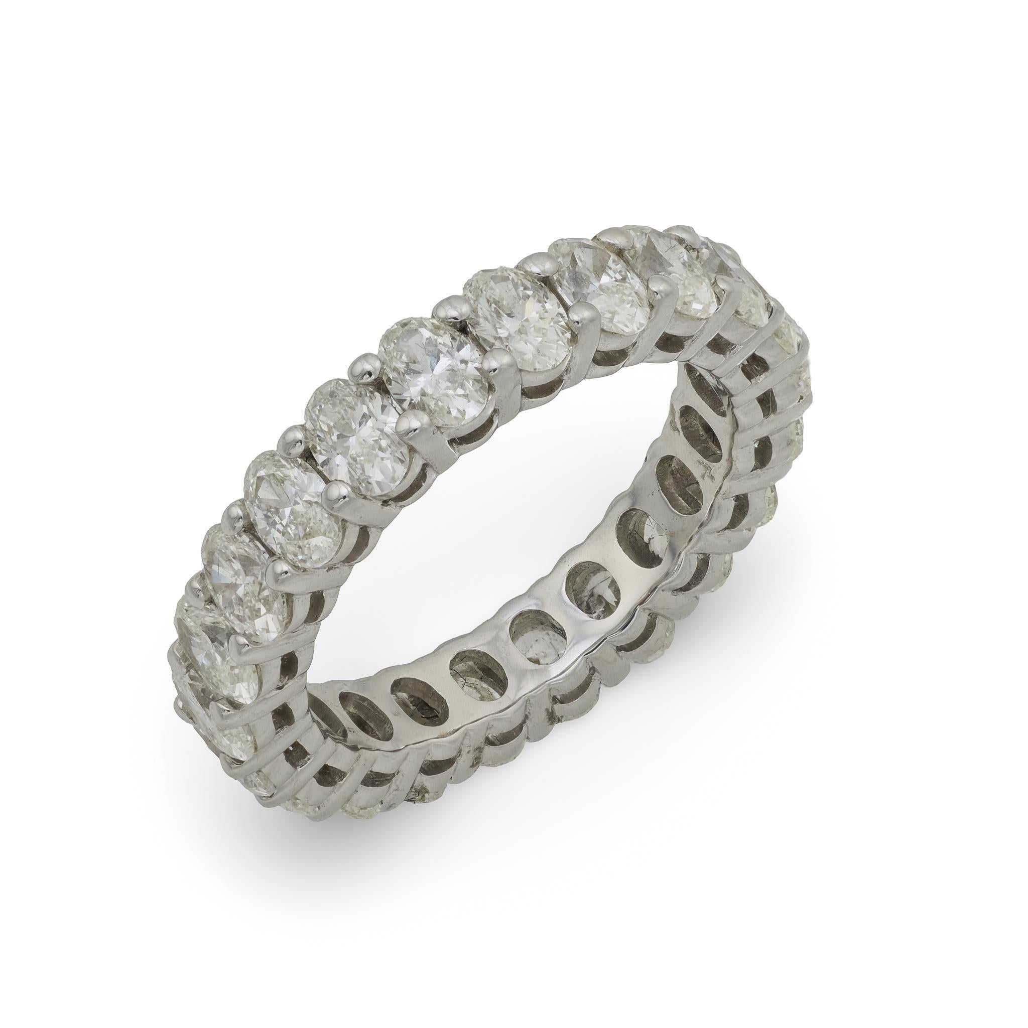 Modern Vintage 3.05 carat oval diamond 18k white gold eternity ring For Sale