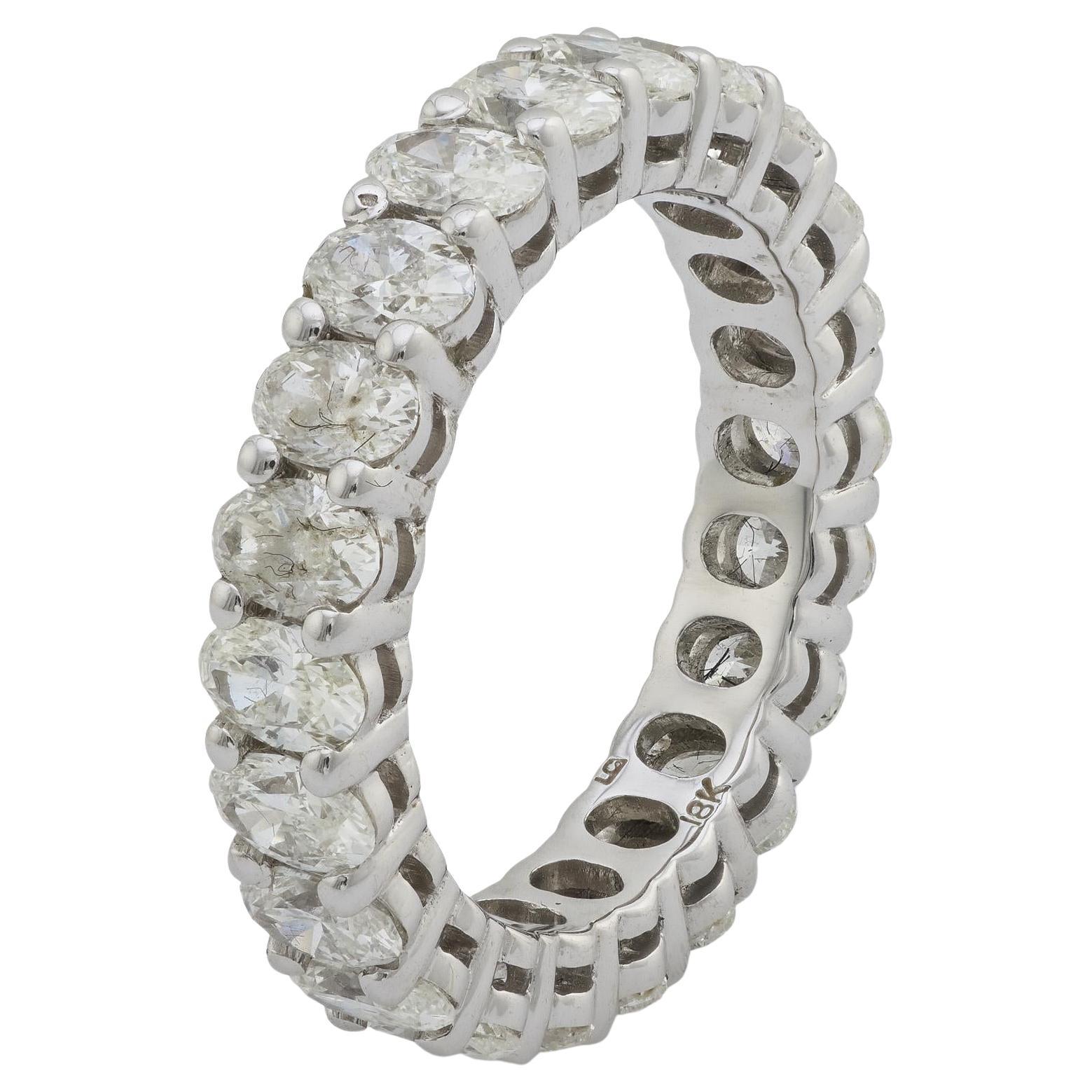 Vintage 3.05 carat oval diamond 18k white gold eternity ring For Sale