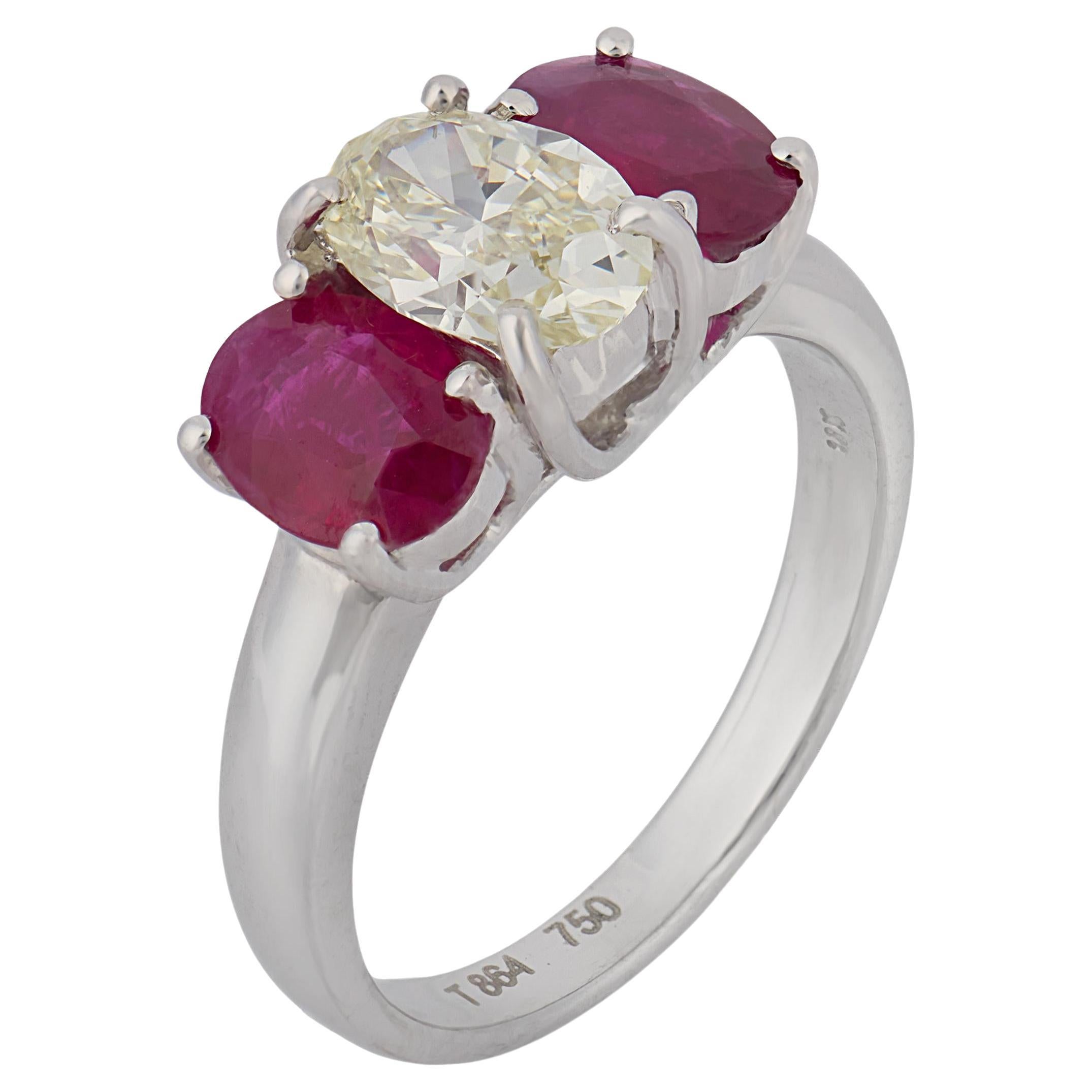 Vintage 3.10 carat diamond and ruby 18k white gold three stone ring