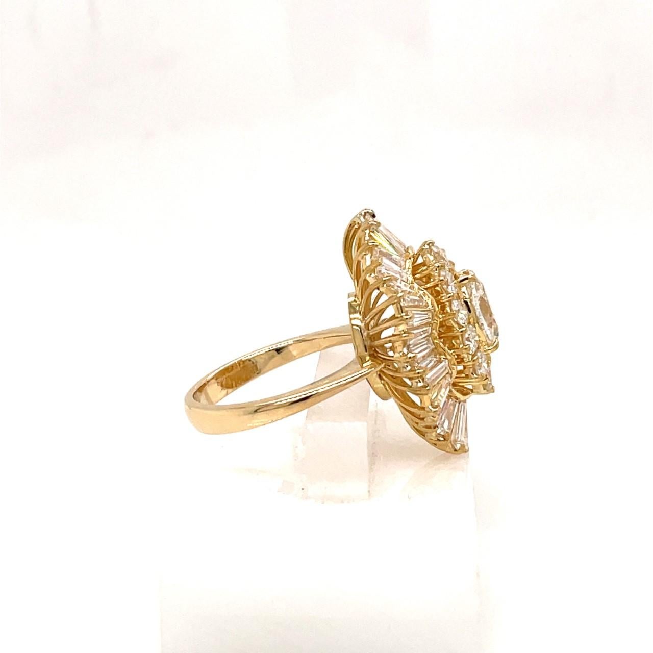3.14tcw Diamanten
18k Gelbgold Fassung
Diamanten in Marquise-, Rund- und Baguette-Form