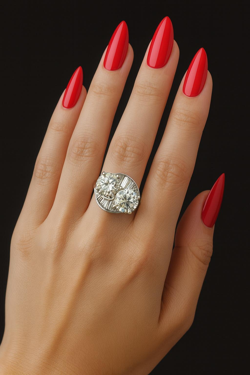 Vintage 3.16 Carat Transition Cut & 0.45 Carat Baguette Diamond Platinum Crossover Ring

This vintage platinum crossover ring features two beautifully matched old transition cut diamonds, an early form of the modern brilliant cut. The center stones