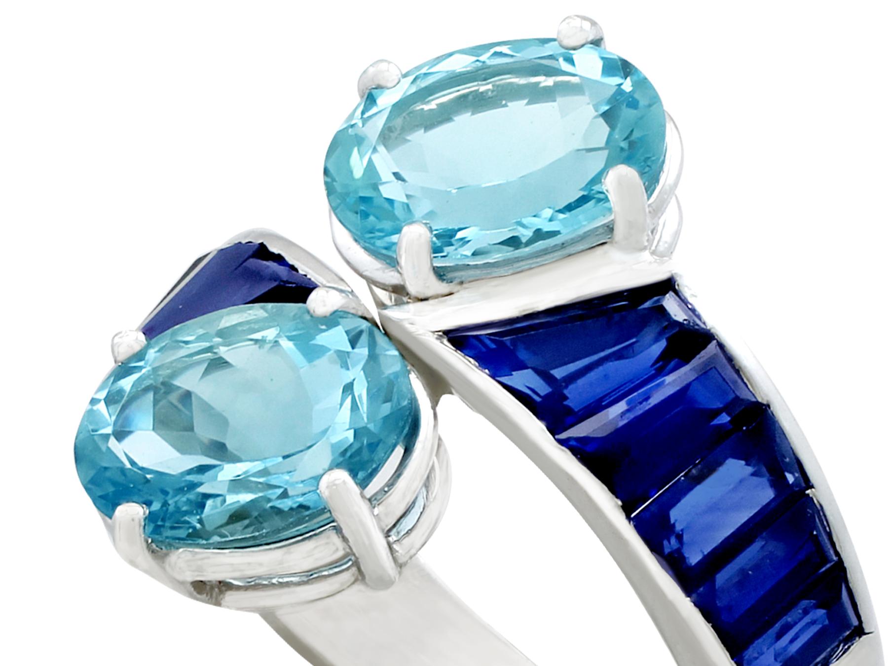 A stunning vintage 3.22 carat aquamarine and 2.05 carat sapphire, platinum twist style dress ring; part of our diverse gemstone jewellery and estate jewelry collections.

This stunning, fine and impressive vintage aquamarine twist ring has been