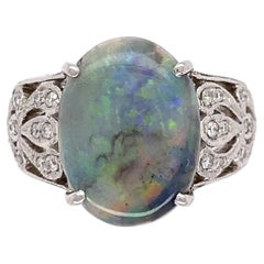 Vintage 3.32 Carat Oval Dark Gray Opal and Diamond Platinum Ring