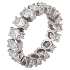By Vintage 3.40 carat oval cut diamond platinum eternity band